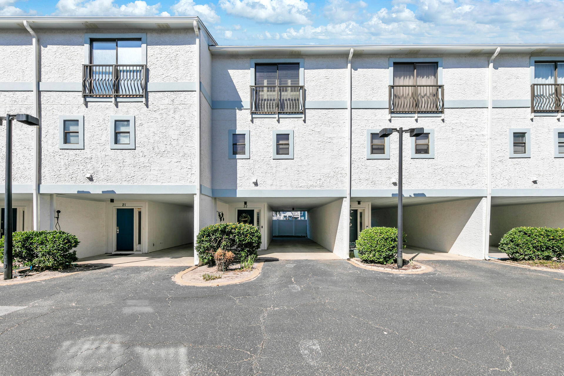 Do not miss your chance to purchase a Costa Vista Townhome located just steps to the beach with a GULF VIEW ! On the first level you will find a covered carport made for two vehicles which is private and only designated for this unit along with exterior storage and a little grassy area- a rare feature at the beach! Many updates have been done to make this unit simply the best including , luxury wood and tile flooring throughout , stainless steel appliances, coastal tiled walk in master shower, built in bunk beds, and much more! TWO private balconies give you excellent views of the Gulf plus plenty of space to enjoy daily sunsets and outdoor dining. Sold fully furnished and turnkey ready with a STOCKED kitchen so you can make meals just like at home. The HOA dues are low and the community pool is included! You are only a few minutes away from the sugar white sand and emerald green waters all for a GREAT price!