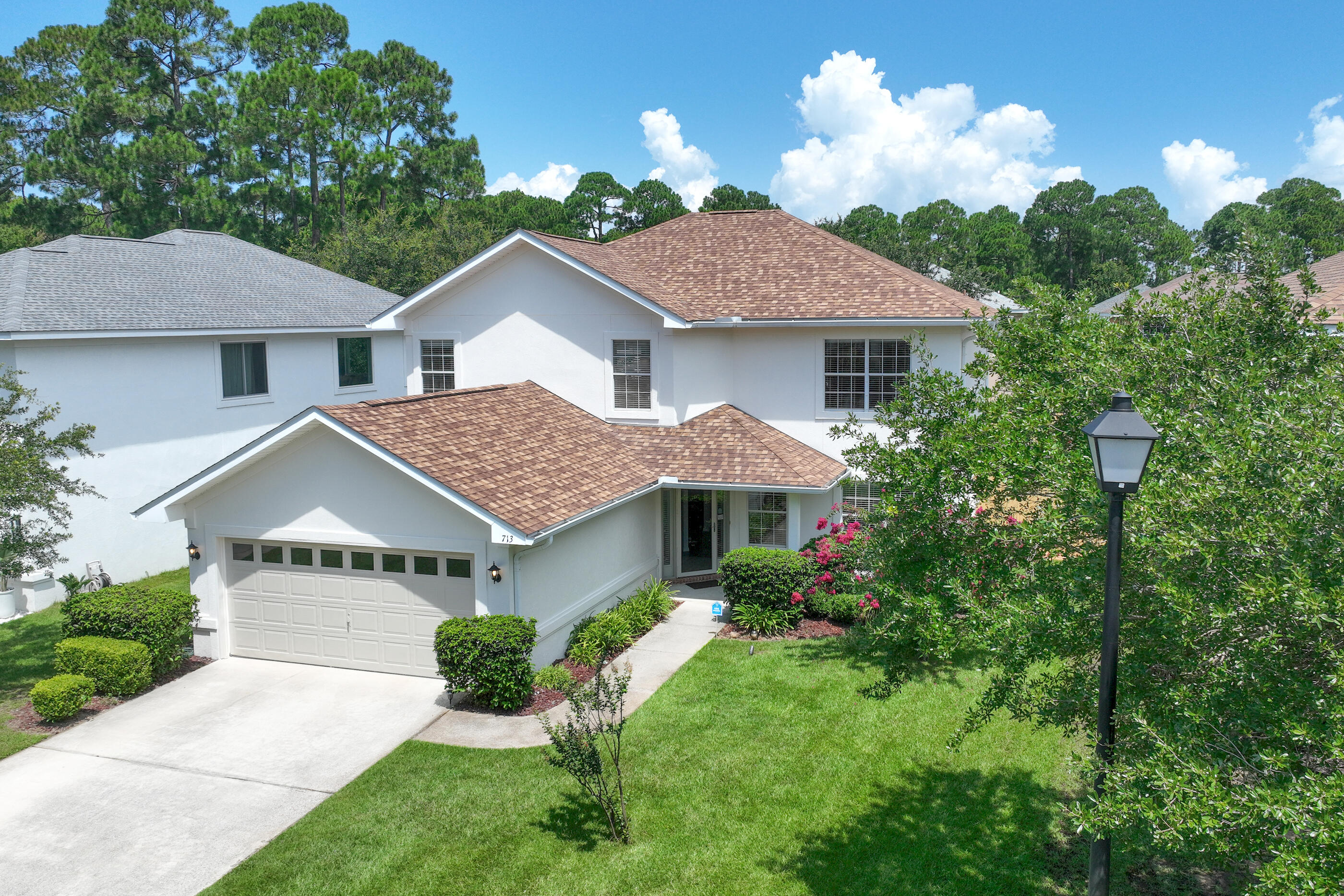 Enjoy coastal living in the coveted neighborhood of Driftwood Estates. This beautiful 5-bedroom 3-bathroom home with an extra-large covered and screened in lanai is move-in ready.
As soon as you arrive at this gorgeous property you will notice the freshly painted exterior with new outdoor lighting (July 2025), and a meticulously maintained lawn.
Upon entering the home, you'll be greeted with a freshly painted interior (July 2025) and will be met with a wonderful open floor plan which boasts a large front room and dining area where you can entertain with ease. Whether it is a large family get together or hosting friends you will have plenty of room to make lifelong memories.
The entire primary floor is wide plank engineered hardwood.
The large and open concept kitchen with stainless steel appliances and a breakfast bar flows into a spacious family room perfect for movie nights or extra space for entertaining.
Off the kitchen you can walk through the French doors into your very own private backyard entertaining haven. The oversized roof-covered and screened in lanai measures 400 square feet with travertine marble. This lanai had all screens replaced in 2022 and completely repainted in July 2025. It is the perfect place for outdoor entertaining with doors on either side leading into the newly fenced-in backyard (also July 2025), which is perfect for pets, gardening, a backyard kitchen, or constructing your own custom pool.
Also, on the main level you will find a primary-floor bedroom with a walk-in closet. This bedroom comfortably fits a king-size bed or can be used as a home office or crafting studio and has a full-size bathroom just outside the door.
Up the stairs you will walk into a large lounge area which can be used as an office, sitting area or play area. Surrounding the landing, you will find 4 bedrooms, with the oversized master bedroom boasting a bath with dual vanities, a jetted soaking tub, separate shower, and spacious walk-in closet with built-in shelving and drawer space.
This home also has an upstairs laundry room, making life that much easier.
The entire roof of the home including the lanai was replaced in August of 2024.
The two-car garage has shelving for extra storage and access to the attic for more storage.
This incredible home is minutes from the pure white sugar sands of the Emerald Coast, a short walk or bike ride to the Choctawhatchee Bay.
Driftwood Estates has a wonderful 11-acre park with a community room used for birthday parties, workout mat classes, card playing, and other social activities. The community also has an outdoor pool which regularly hosts water aerobics, and food trucks weekly. The park contains basketball courts, grills, multi-purpose fields, tennis courts, pickleball courts, picnic pavilions, a sand filled playground, restrooms, a paved walking/running path to enjoy the beautiful nature surrounding this neighborhood.
Minutes away is Sacred Heart Hospital and Grand Boulevard with fine dining, shopping and family entertainment. Sandestin's Village of Baytowne Wharf is also close to this home where more shopping, dining, fireworks, drone shows, concerts and fun family activities are regularly held. Imagine yourself enjoying this breathtaking Emerald Coast lifestyle!
This is Florida living at its best. Call today for more information and to set up your private showing.
All information and measurements are deemed accurate but should be verified by the buyer.