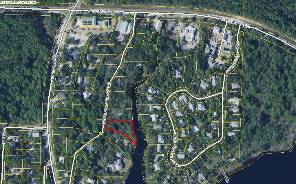 Almost 3/4 acre Western Lake front site in private, low traffic Grayton Trail. Heavily wooded with sizable native hardwoods, magnolia trees. 110' on water allows for boat, SUP, Kayak access to Grayton Beach, Grayton State Park and Watercolor. Dock allowed with permit. Underground utilities including natural gas. CDLPZ applies Remedial Amendment effective mid December 2016. Covenants have expired, County codes apply. Grayton Trail is one of area's most beautiful subdivisions and best kept secret.