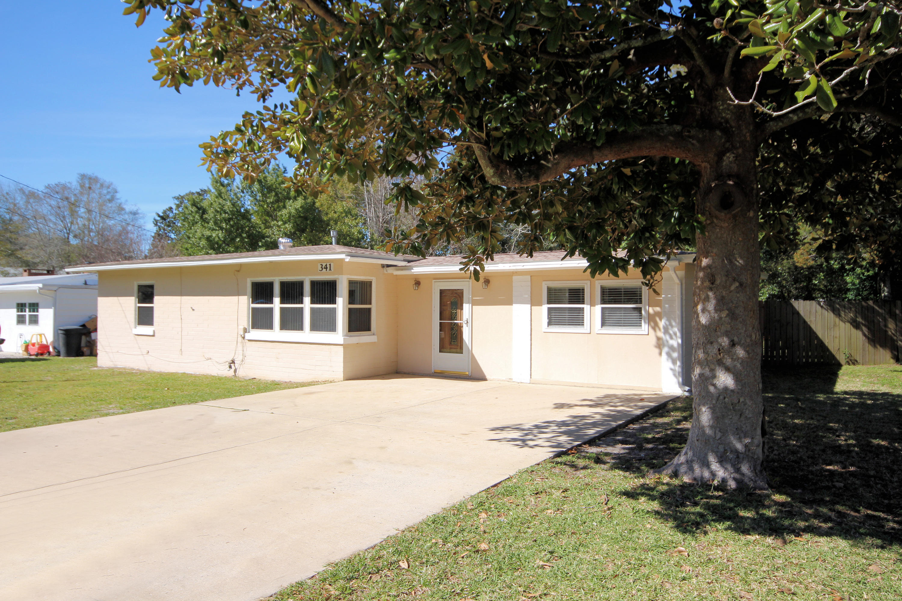 Perfectly maintained 3 bedroom/1 bath home with 1471 sq ft in the desirable Elliott's Point Neighborhood only a 1/2 mile from the beautiful bay! This home has been meticulously maintained and many improvements have been done by the homeowner. The interior walls and ceilings were painted in 2016 and the roof was replaced in 2015! The homeowner has also installed double pane windows, replaced the hotwater heater (2007), the wiring (2010, copper), and front door. Other improvements include: updated bathroom, new smoke detectors, gutters on front of home, a storm door by Pella, tile flooring, and light fixtures! The kitchen features a built-in microwave, side by side refrigerator, dishwasher, and stove.