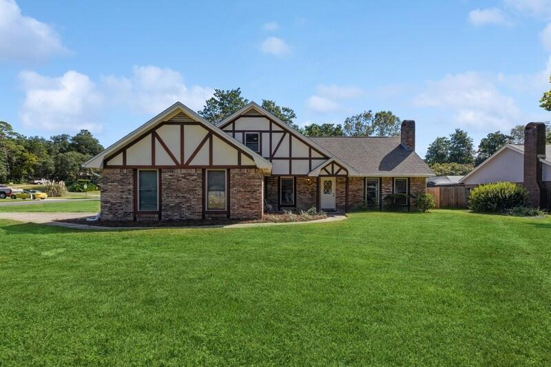 Welcome to the desirable Woodlands neighborhood of Bluewater Bay! This lovely residence offers fantastic recreational opportunities with the Woodlands Park & Pool less than 1/2 mile away and only 4 miles to the Bluewater Bay Marina making this a great location for those seeking an active lifestyle. As you step inside, you'll immediately appreciate the spaciousness and charm of this 5-bedroom, 3-bathroom home. The foyer leads to a welcoming family room featuring a 14 ft peaked ceiling and a cozy brick fireplace. The generously sized eat-in kitchen was thoughtfully updated in 2021 with new flooring, fresh paint, painted cabinets, and brand-new appliances, including a refrigerator, stove/oven, and dishwasher. Meal prep and family gatherings will be a breeze in this space. There's even a perfect spot for a coffee bar!
Adjacent to the family room, the dining room also boasts a soaring 14 ft peaked ceiling, adding an elegant touch to your formal dining experiences.
The convenience of a first-floor primary bedroom cannot be overstated, complete with an ensuite bath and a walk-in closet. Two additional bedrooms, another full bath, and a convenient laundry room round out the offerings on the first floor. Don't forget to discover the almost hidden large storage closet in the hall bath.
The interior has been tastefully refreshed with a neutral decorator-selected color scheme, giving the home a modern and inviting atmosphere. In July 2023, the lower-level flooring (except for the kitchen) and the upstairs bathroom flooring were upgraded to waterproof LVP, ensuring durability and style.
Venturing upstairs, you'll find two generously sized bedrooms with brand-new carpeting installed in July 2023, adding warmth and comfort to these spaces. Another full bath completes the second-floor layout.
Numerous updates have been made to enhance your living experience, including a brand-new garage door and opener (2023), a HVAC system (2021), a privacy fence (2021), and windows replaced in 2004. Not to mention new ceiling fans, blinds and more. Seller is willing to replace roof prior to closing with an acceptable offer.
Situated on a 1/3-acre corner lot, this home offers an expansive backyard with a privacy fence, providing ample room for a future pool, gardening, or outdoor recreation.
The Woodlands neighborhood boasts the added advantage of no HOA fees and is zoned for highly rated schools. In just about 15 minutes, you can reach the stunning beaches of Destin or the gates of Eglin Air Force Base, ensuring easy access to work and leisure.
Don't miss the chance to make this remarkable Woodlands home yours! Schedule your showing and experience the best of Bluewater Bay living.