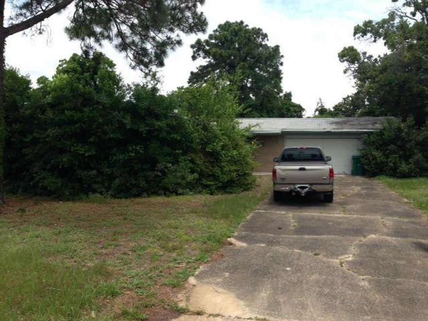 This house is in need of a lot of work, Dry wall needs to be replaced and floors need to be installed, Buyer to verfiy square footage and Room size