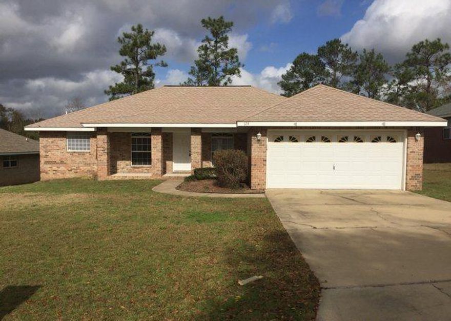 REO ~ Spacious all brick home offers lots of potential for starter home! The 3 Bd / 2 Ba home features living room with fireplace, eat-in kitchen & formal dining room. The master bath features his & her vanity as well as garden tub. Don't miss out on this great home.