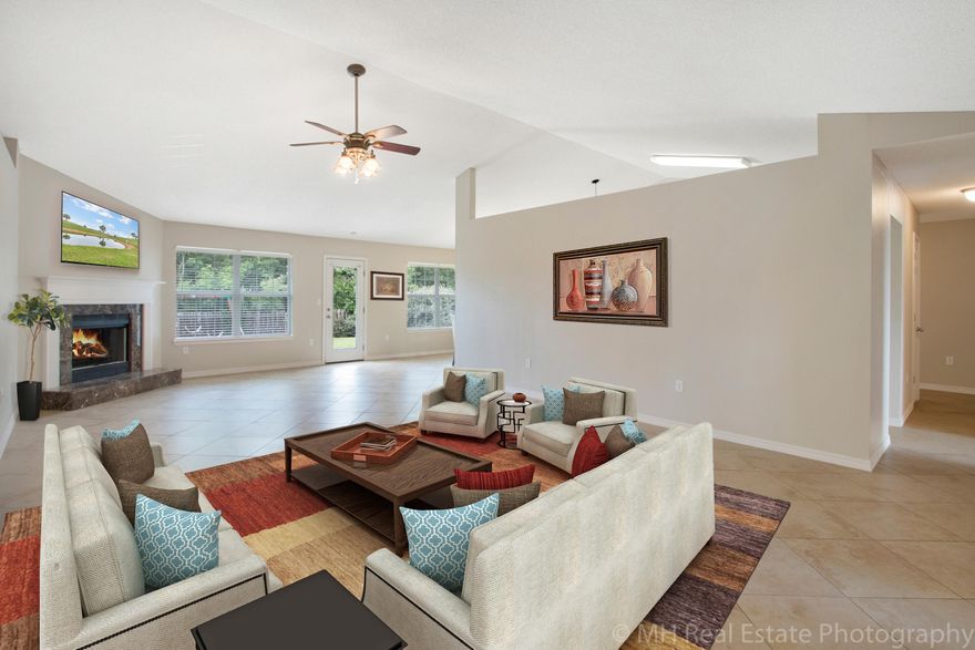 Come marvel at this gorgeous, airy home. It has everything you can wish for! Office, formal dining room, 4 spacious bedrooms, 2 deluxe baths, and 2 car garage. Hand scraped wood flooring in front rooms melt into 18 inch diagonally set tiles. A cozy fireplace for those chilly nights, great big backyard with a kid's play set for fun summer BBQ's. The master closet is huge, complete with a window! The kitchen is a true chef's delight, counter space in abundance, cabinets for everything imaginable and bright sunshine echoing off creamy, neutral tile backsplash. Two inch wood blinds adorn every window, but this home backs up to nature for even more privacy! Only 4 houses down from the park, for a great location! 25 minutes from the base, take the first turn in Crestview to skip the traffic.