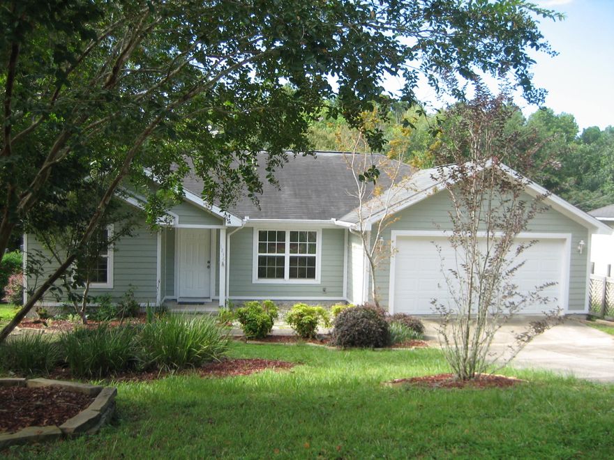 This 3 bedroom, 2 bath home is in excellent condition. Freshly painted, all wood or tile flooring. Looks like new inside and the outside is a health conscious person's dream. There are fruit trees such as fig, peach, pear, orange, Paw Paw, Persimmon and more. Large backyard with some covered area which is protected from weather for usage for picnics and BBQ's. Both inside and outside A/C units have been replaced in 2016. This home is on a large corner lot with room for camper or RV if needed. It has a double car garage with lots of room for more storage. Siding on this home is hardy board making easy to maintain.