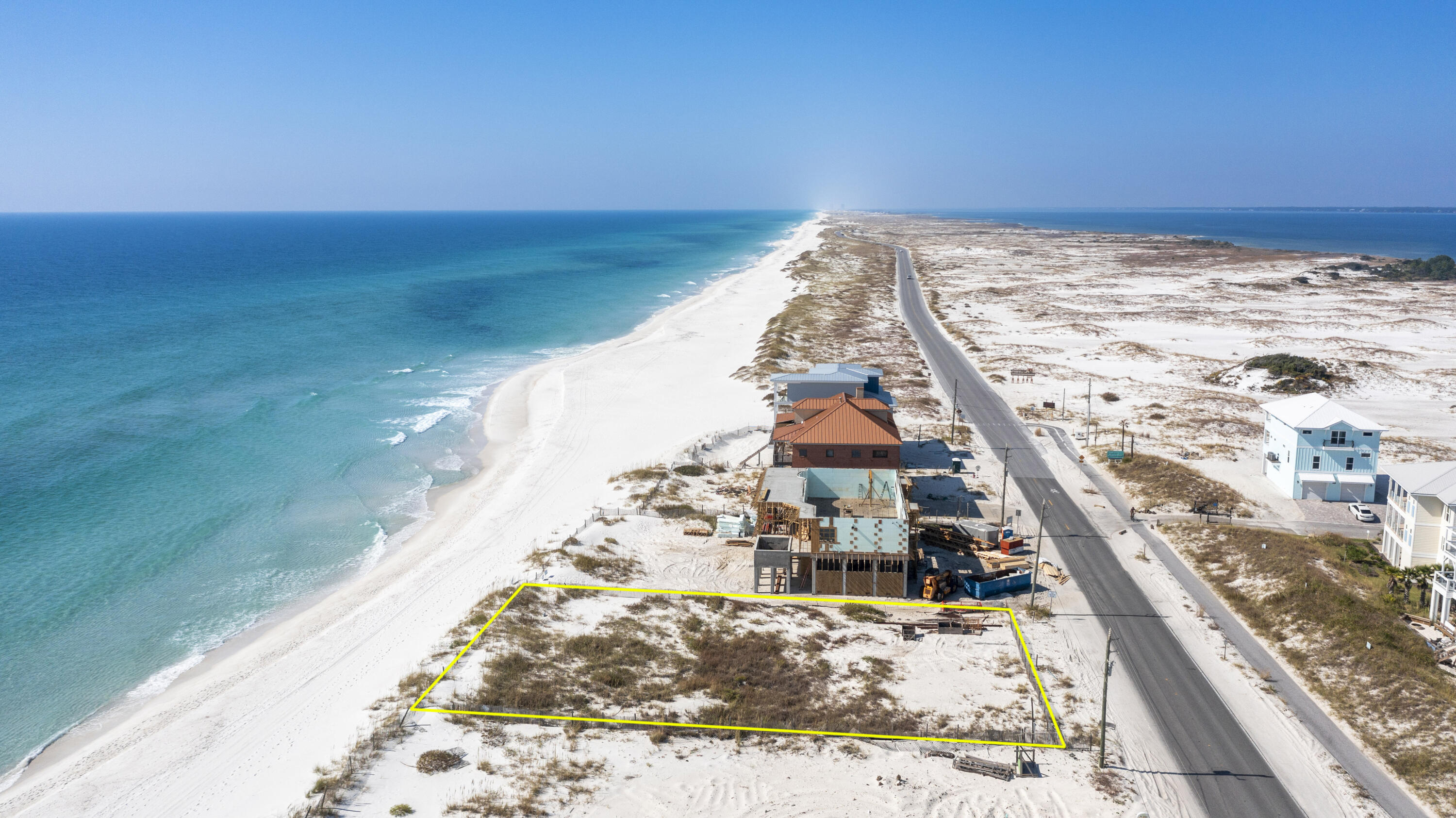 YOUR GULF FRONT PARADISE AWAITS! This pristine homesite is located just steps away from the Gulf Islands National Seashore and is perfect for you to build your dream home on the white sandy beaches of the Emerald Coast. With 95 feet of Gulf frontage, you have plenty of room to build your Gulf Front retreat. The uniqueness of this property allows you to enjoy sunsets on the Gulf and sunrises on the Santa Rosa Sound within the comfort of your own home. Words can't describe the lifestyle you can live in this amazing location! Don't miss out on the very rare opportunity to make this place your own.