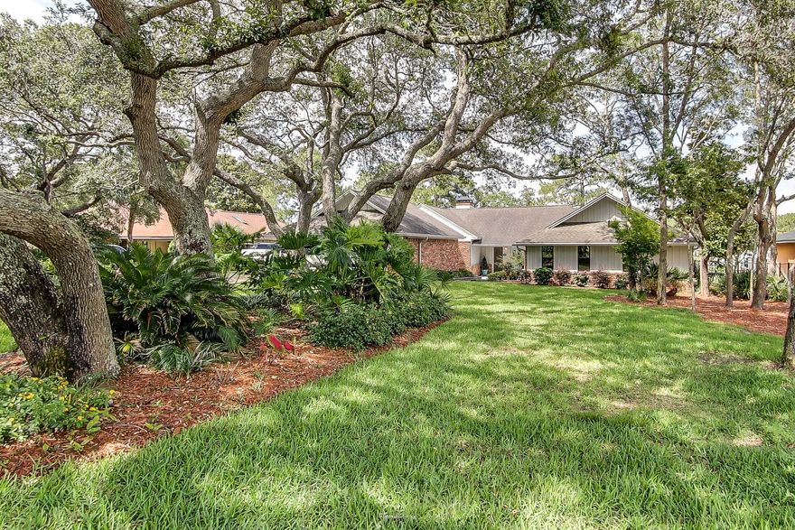 NEW PRICE! If you're looking for a home in Destin for a large yacht or sportfisherman that is protected as well as in a great neighborhood, then this is it! This dock can hold 50-60 ft yachts, and you can enjoy them and the view from the recently redone pool and patio.The house is open and spacious with large bedrooms that each have their own bath! The living and kitchen areas are also open with a centerpiece, double sided fireplace to give separation for the large dining room and living room. The living room also opens out to a large, heated and cooled Florida room that looks out over the pool. The quality and layout of this house are great, and it could be phenomenal with the right updates.