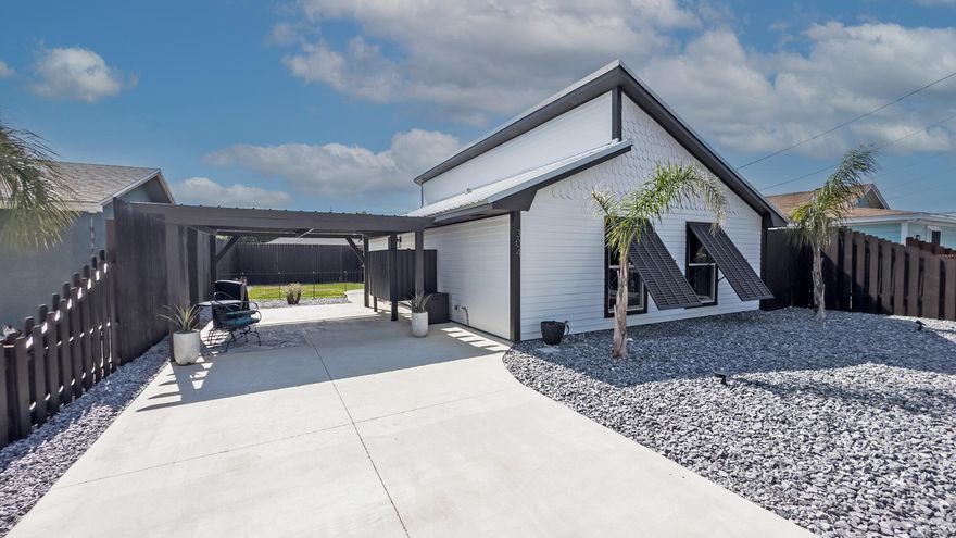 This is an over the top Beach Home at Bid a Wee Dedicated Beach. Home has gone thru an extensive remodel/upgrade where Every room in the Home , the yard and outside was upgraded. Owner has his list in the documents., Ask your Realtor for this . 2 Bedrooms, 2 Baths and Nice sized Family Room, Dining Area and Kitchen area. Open Concept for great entertaining .There is a Sun Porch area that could be used as sleeping quarters since it has a closet, windows and doors. The Yard is stunning with ease to maintain a priority. You will spend a lot of time outside on the Patio Area with TV already wired .Eight Foot Privacy Fence , new Metal Roof . Take the short walk to Bid a Wee Beach where there are private locked gates for your safety and 5 entrance points.