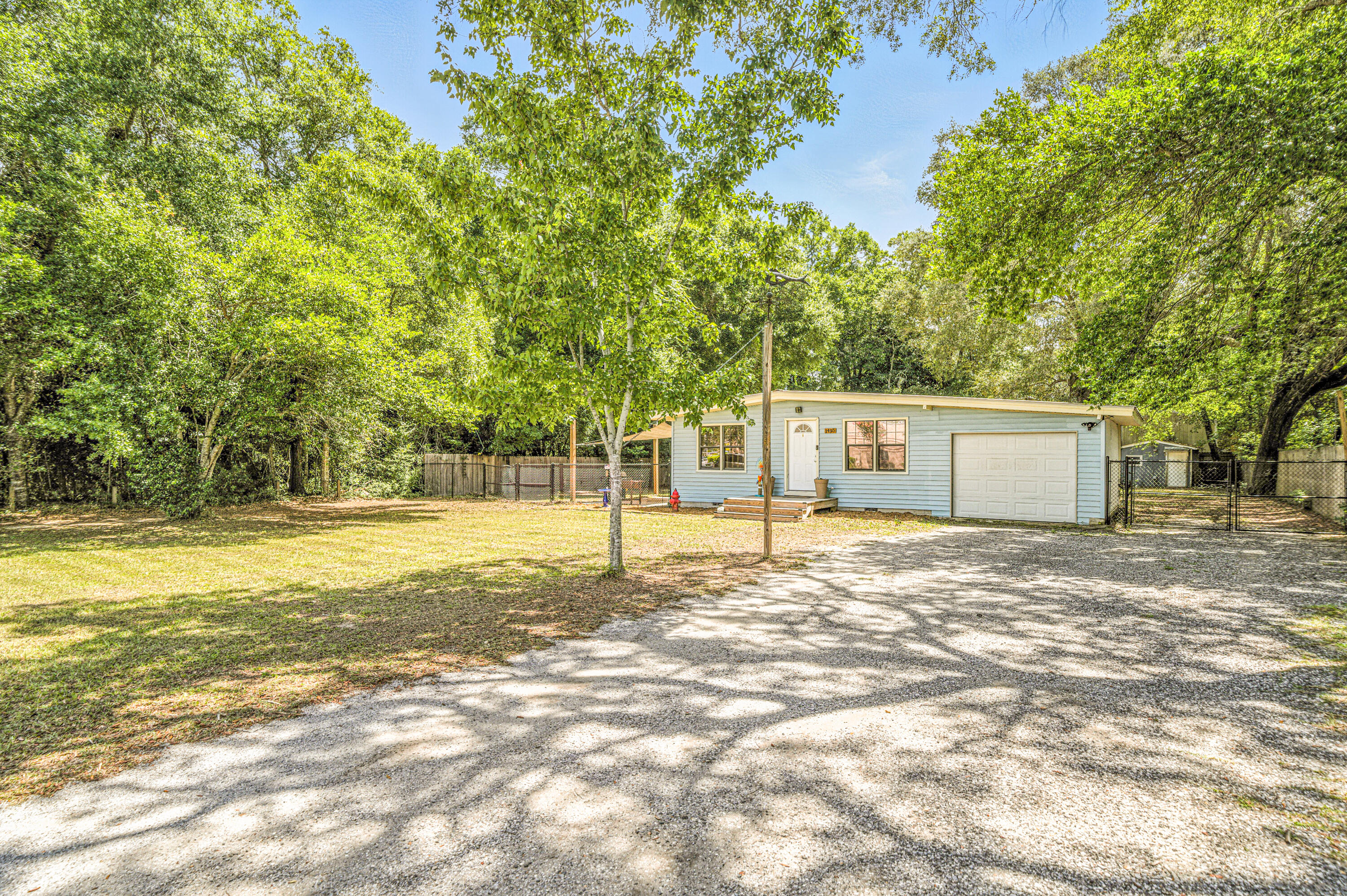 COMING SOON! The CUTEST Florida cottage is coming to the market soon! This 3 bedroom | 1 bath home offers some really amazing highlights for the price! Sitting on just under a half acre lot, this property offers a 35 x 24 metal garage with electricity, a 24x24 pole barn, an additional shed, an ample patio for entertaining and NO HOA! This property offers ample space to enjoy the outdoors, hobbies and has plenty of storage for boats, bikes and more! Professional photos and video coming soon!