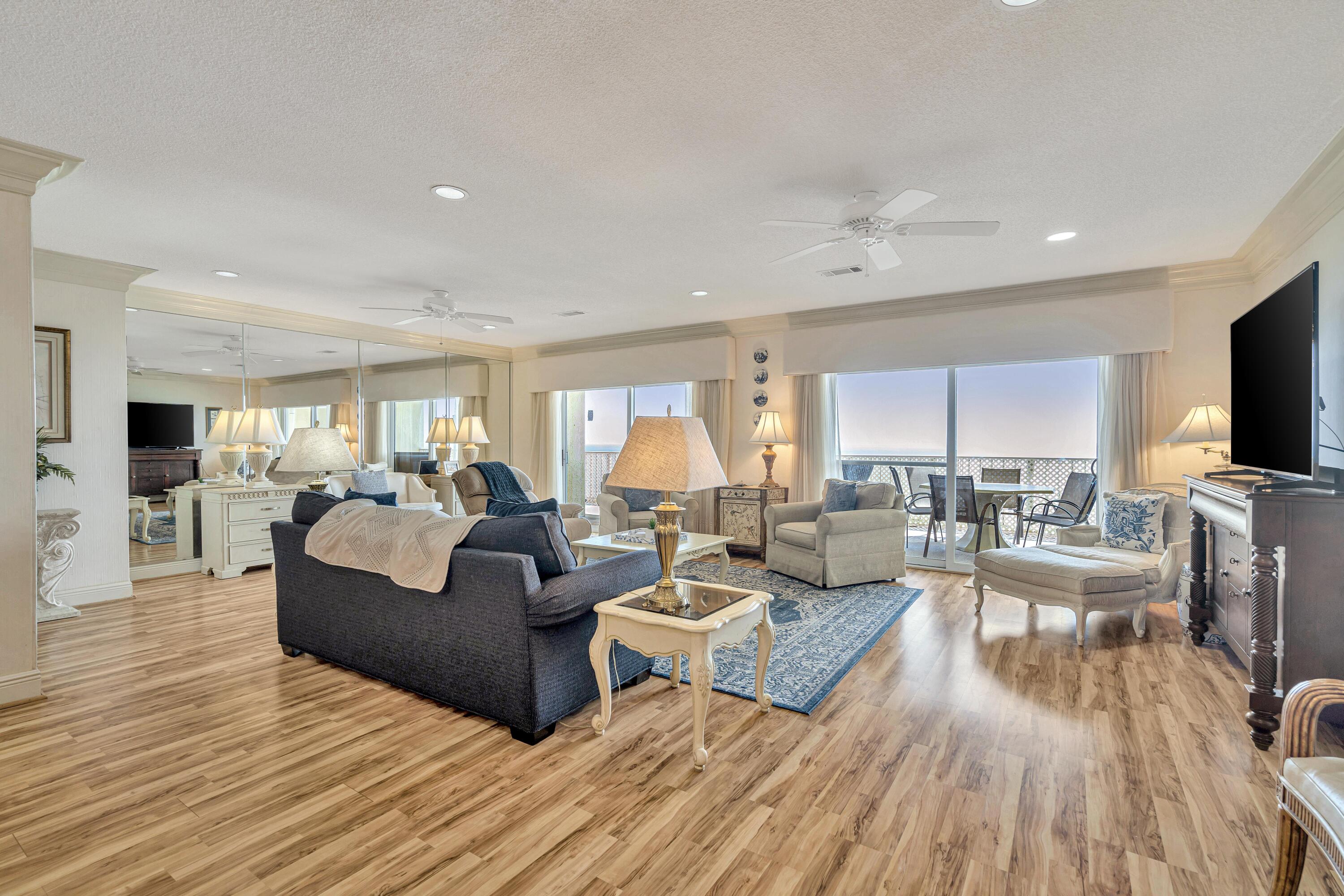 Welcome to the epitome of coastal luxury living - a breathtaking Gulf front 3-bedroom, 2-bathroom penthouse that embodies the essence of tranquility and elegance. Perched atop a pristine beachfront property, this penthouse offers an unparalleled panoramic view of the sparkling cerulean waters of the Gulf of Mexico. As you step inside, you're immediately greeted by an open-concept living space that seamlessly combines style and comfort. The interior design boasts a fusion of modern sophistication and coastal charm, with soft tones of sand and sea reflecting the surrounding natural beauty. Large windows spanning from floor to ceiling flood the living area with an abundance of natural light, creating an airy ambiance that complements the spacious layout. The gourmet kitchen is a masterpiece