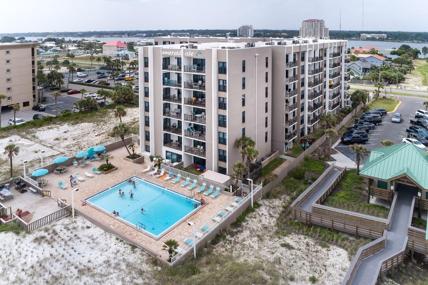 Wonderful opportunity to make this huge condo with fabulous views all your own.  It is in great need of a new look. This waterfront condo has not 1 but 2 very large balconies with Gulf and Inter coastal waterway views.  Enjoy spreading out and enjoying the views and beach front pool and enjoy the beautiful white sand beach and emerald waters.  Lots of storage space in condo plus 5ft x 6ft storage space on ground level and shared storage unit near stairs on same floor.