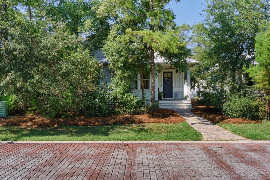 Located in the Point Washington Road community with access to all the outdoor activities that South Walton has to offer, 117 Devlieg Avenue is ideal as either a primary home or vacation home! The spacious single-story floorplan with 10-foot ceilings features 4 bedrooms, an office, separate living and kitchen spaces, and a central exterior porch, as well as a full 3-car garage. As you enter the home, step into a dedicated foyer area that opens up to both the office space with front-yard view and the large main living space with 12-foot ceilings and custom trim accents. A secondary bedroom with en-suite bath is located to the front of the home. Two additional guest bedrooms with a shared bathroom are located centrally. The separate kitchen features ample storage and counter space, and GE Profile appliances meaning that there is always room for cooking a fine meal. The private master bedroom at the rear of the layout features a wood-plank tray ceiling, and a gorgeous private bathroom with walk-in closet. The central porch can be accessed from the dining space. There is parking space for 3 full-size vehicles in the detached garage, and three more can fit in the driveway. For boaters and kayakers access to the Choctawhatchee Bay is located just one block away via a hidden-gem public boat-launch into McQuage Bayou. If you prefer walking or riding to the Bay, the nearest public access is less than a half-mile down the street. And for hikers, Point Washington State Forest runs the length of Point Washington Road, just a block South. With a central porch, a stand of old-growth in the front yard, and HOA-maintained greenspace directly across the street, the home provides nature and seclusion--even in the midst of a vibrant neighborhood with conveniently-located community pool and nearby to dining and shops. With a mix of private comfort inside and immediate access to a variety of natural wonders outside, this beautiful custom home is uniquely situated to provide everything you are looking for.