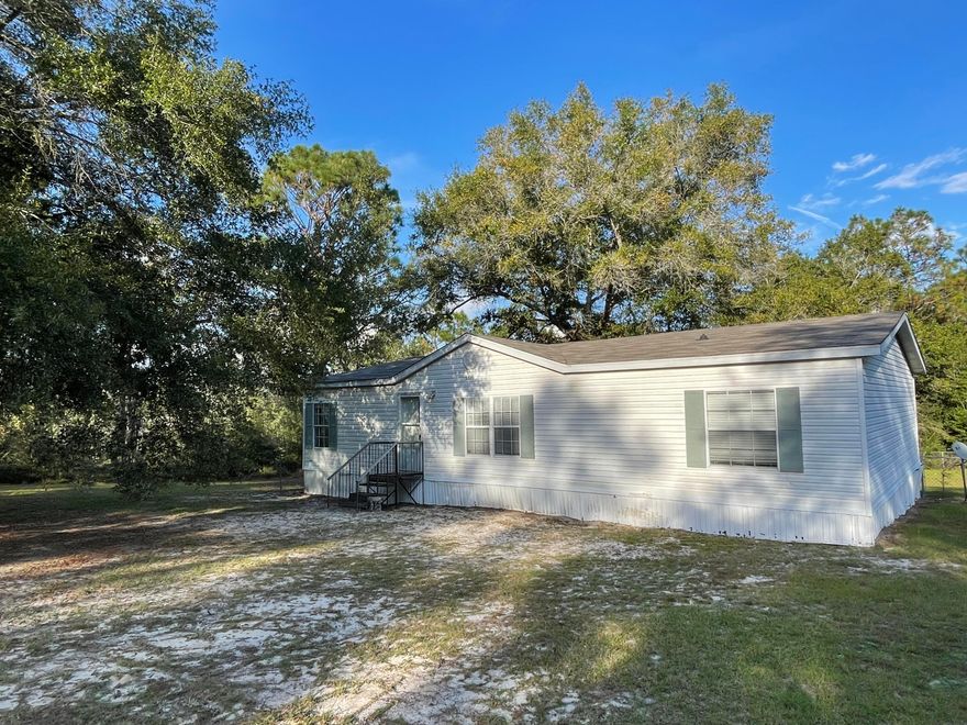 Resting on just over 1 acre this 3 bedroom 2 bath split bedroom REO home was built in 1993 and has tons of potential. If looking for an opportunity to repair and rent, move in, or even resale, this may be the one for you. Home has chainlink fenced back yard and lots of room for sheds, workshops and more. Though this home will not qualify for most all financing, it is certainly a must see to appreciate. Call today!