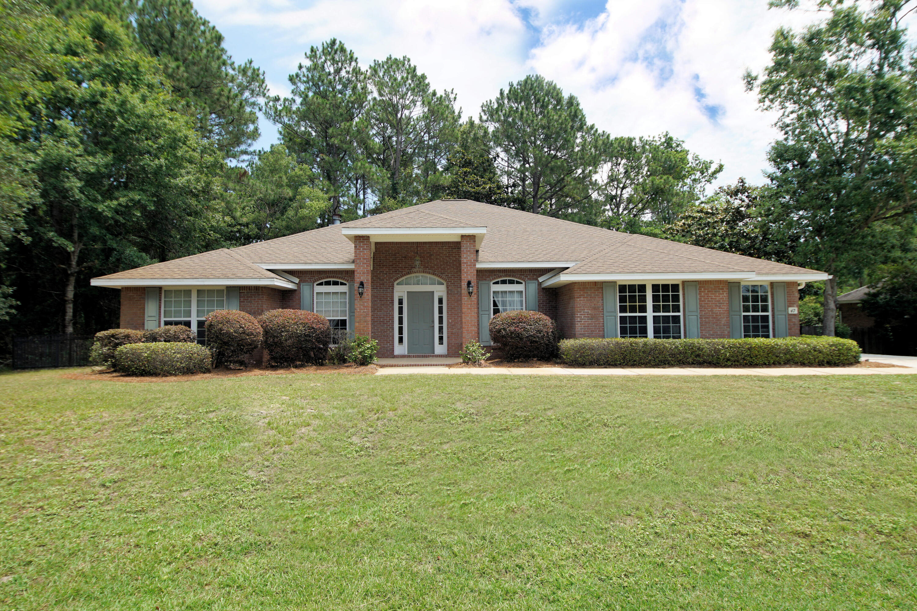 PRICE REDUCTION! MOTIVATED SELLER!! One Owner Brick 3-Bedroom with an office sitting on a 1/2 acre lot in the Indian Bay waterfront community Between Bluewater Bay and Freeport. Selller to install new roof with an accepted contract. Split floorplan to include a formal dining room, large kitchen with attached breakfast nook. Spacious living room with wood fireplace, enclosed porch off the living area. Master bedroom is large with oversized master bath to include his and hers vanities, garden tub, walk-in shower, the other 2 bedrooms are nice sized, Fenced back yard with deck.