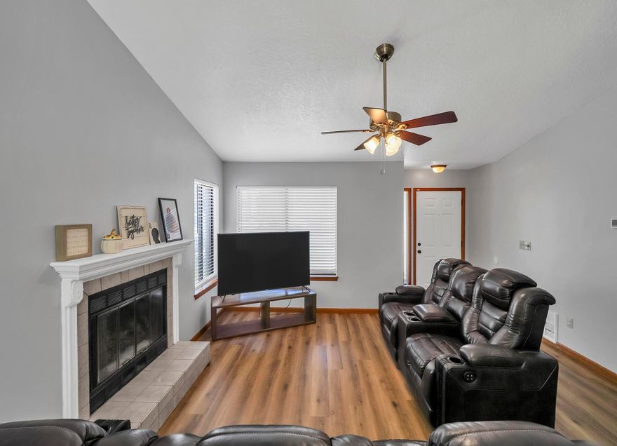 Welcome to Cedar Ridge Way! This charming 2 bedroom, 2 bath home is situated in a small subdivision that boasts the perk of having No HOA. With a recent makeover, this home showcases newly painted walls, a brand new roof, new deck, new siding, a new fire pit and new flooring throughout.As you step inside, you'll be greeted by a light and airy atmosphere that creates a warm and inviting ambiance. The open floor plan seamlessly connects the living room with a cozy fireplace, dining area, and kitchen, making it ideal for both relaxing and entertaining.The two bedrooms are well-appointed and offer spacious closets and comfortable spaces for rest and relaxation.