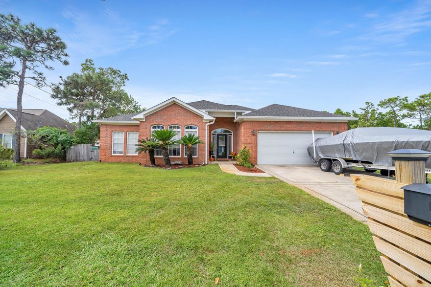 PRICED TO SELL! 3 Bedroom home available in Santa Rosa Beach, no HOA! Room to park your boat or RV! Community boat ramp available! Located just 10 minutes from three public beach accesses!!! Beautiful brick home with an open concept living room/kitchen area, formal dining room, and split bedroom floorplan. The large entryway foyer opens up to the dining room with double tray ceiling and lots of natural light. The kitchen offers stainless appliances, granite countertops, and breakfast bar. The living room features vaulted ceilings and a gas fireplace. The roomy master bedroom has double tray ceilings and the master bathroom has a deep soaking tub, separate walk in shower, and walk in closet. On the South side