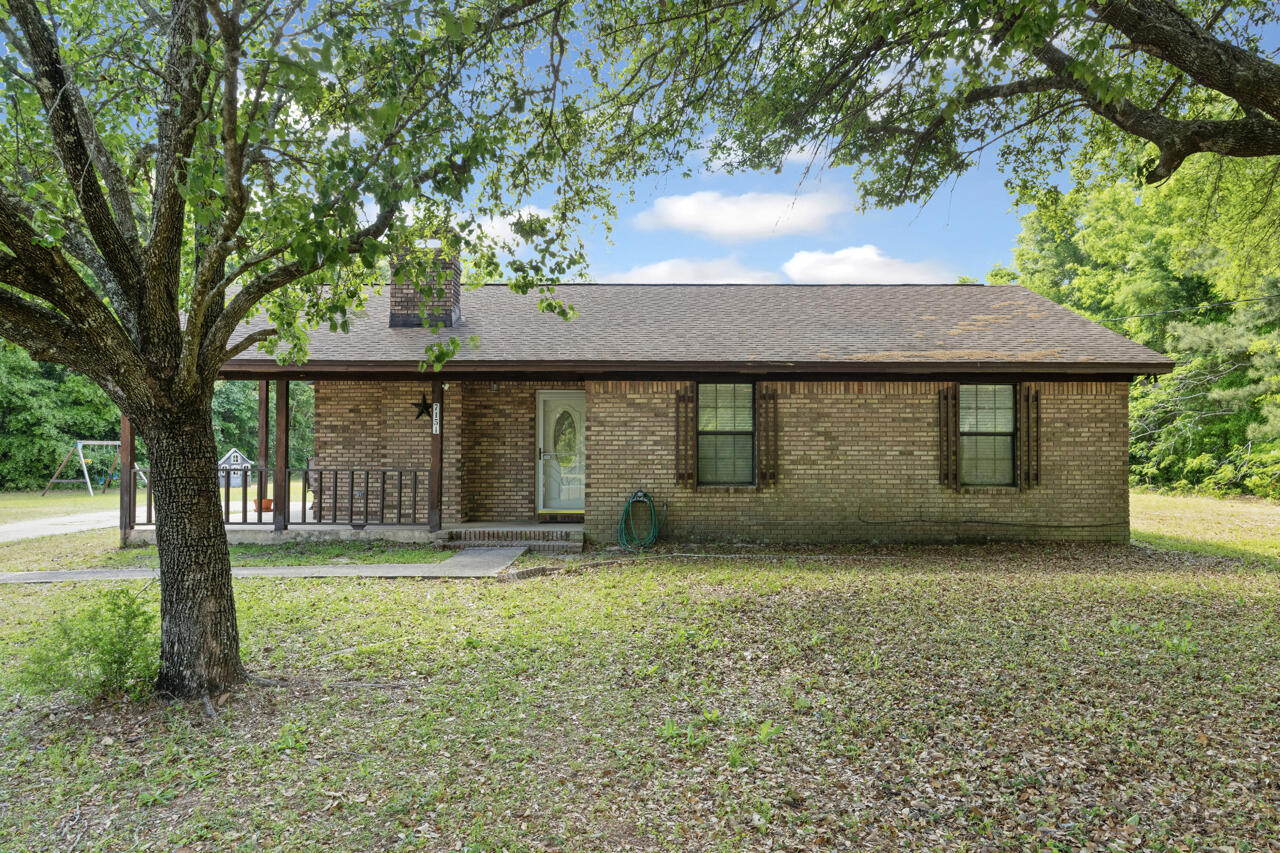 This quaint home sitting on nearly 1 acre of flat property is just the place you need to call home! With 3 bedrooms and two bathrooms this home is the perfect size for your next life journey. Featuring carpet in the bedrooms and tile in the living areas, updated guest bathroom, newer oven/stove and dishwasher, and new ceiling fans. Additional features include: 2 car carport, additional storage area and workshop with power, new back door, wrap-around porch, HVAC replaced 2023, Septic pumped 2024. Roof will be replaced prior to closing with acceptable offer! This growing area of Pace is sure to be perfect for you to plant roots! Schedule your showing today!