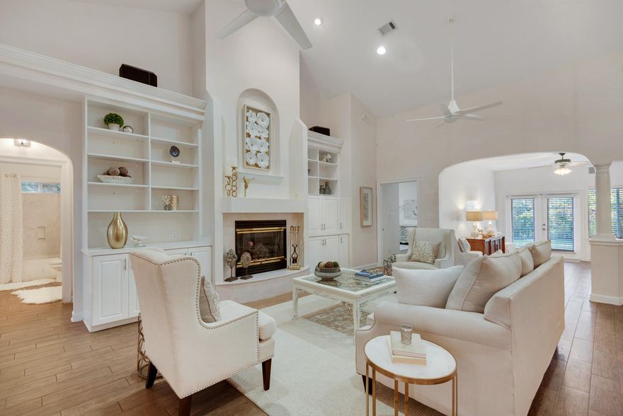 This beautiful, custom built home is perfect for a large family or someone that needs a mother-in-law suite. It is located in the highly acclaimed community of Kelly Plantation. NO FLOOD INSURANCE REQUIRED, SELLER HAS LOMA LETTER!!!! All brick, spacious, beautifully landscaped and well maintained. The living room features high vaulted ceilings, a gas fireplace, built-in shelving & cabinetry for the media system and is very open and bright. breakfast area there is plenty of seating while the chef creates using upgraded appliances, a gas cook top, double electric ovens, & granite countertops. Off the kitchen there is a media/family room the sunroom creates another area of the house for gathering