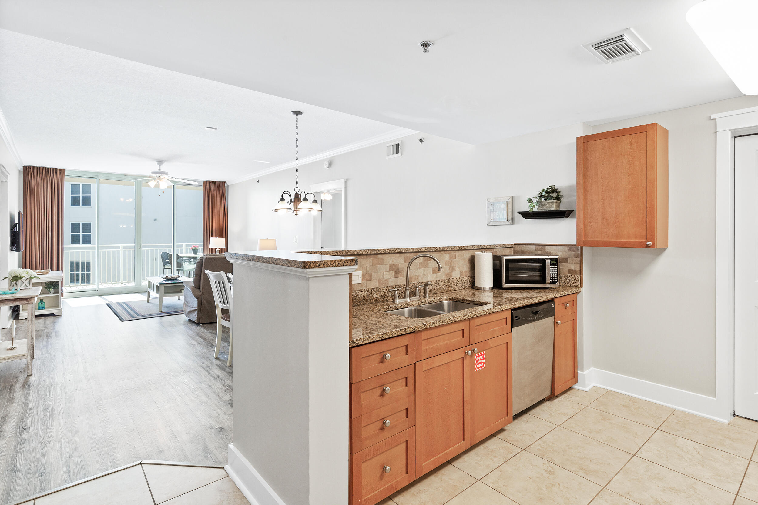 PRIME Location in this beautiful popular FUN Family Beach Resort! Beautiful, spacious & steps to LazyRiver & Beach- Spotless B407 Waterscape 4th fl unit -2br/2.5ba 1292 sf w/bunks! One of the MOST Popular Beach resorts on FL's Emerald Coast! Fantastic rental $60K++ in rents 2021! ALL New paint/trim in Feb.2022 -Agreeable Grey; 1 of the few handicap units; Bunks, K in MBR & Q in GBR; Sofabed in LR-Sleeps 8. Great views of the sparkling Gulf/beach. LR+Both br w access to Huge private balcony; Owner storage. Ac/4yrs. New water heater & w/d, New LPV LR/BR Flooring. Enjoy awesome amenities: 490' beach, lazy river, 2 hot tubs, Fuds food on sundeck, zero edge pool, 10' waterfall, heated pool, kiddie waterpark, covered parking, Great curb appeal. Strong HOA. Across from restaurants, golf & more!