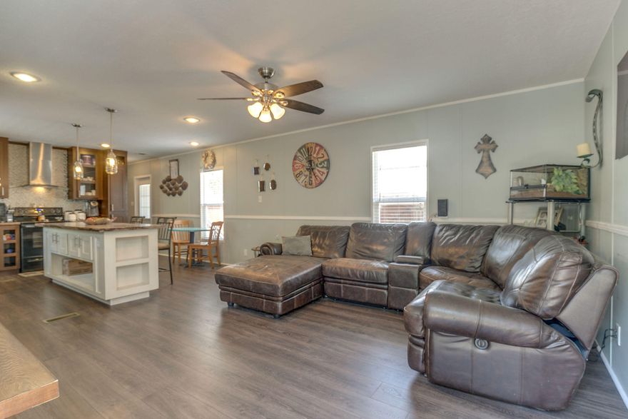 Back on the Market at no fault of the Seller. This 2014 3 bedroom, 2 bathroom mobile home is located just a short drive from the beach complete with new laminate floors, new paint and a newly paved driveway. Spacious kitchen w/ Island, pantry, electric stove, nice cabinets, and tile backsplash. Open Dining/Living room combo. Split floor plan allows privacy for the Master bedroom complete with a garden tub, double vanities, separate shower and walk-in closet. The sellers had the master bathroom tiled and a pre-inspection was completed and everything noted by the inspector has been addressed.Give us a call today to schedule a private showing.