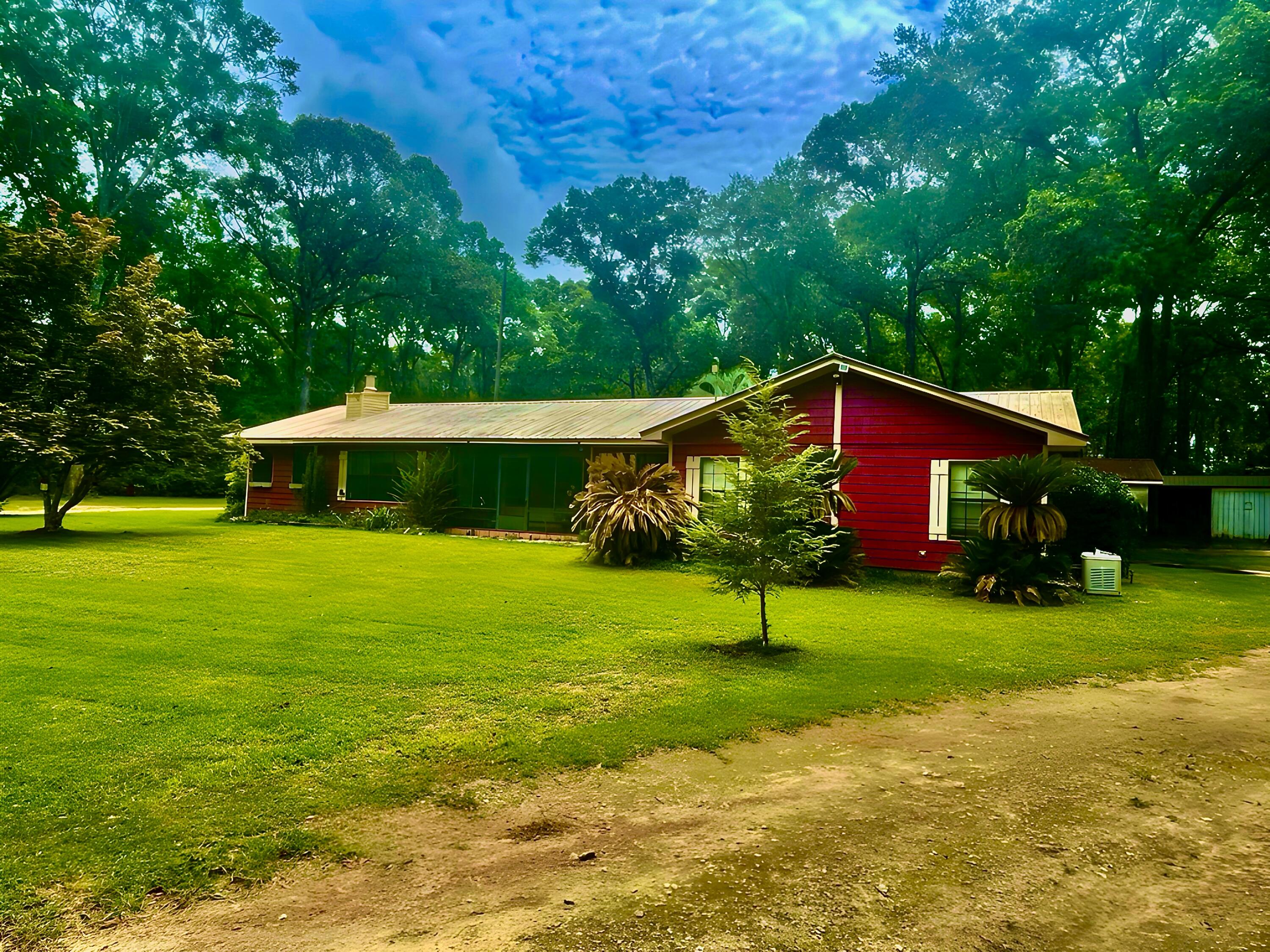 Country living at its greatest on 1.19 +/- acres. Welcome to this beautifully maintained 5 bedroom, 3 bath home located in the quiet area on Highway 0605. Open concept kitchen, large living room, master suite with large walk in closet, private bathroom and hot tub room. Outside features include separate 14x24 office with half bath, pole barn 32x60 with heated/cooled office toilet and overhead storage; small shed; 60x25 shed; large barn for truck or boat. Well pump and electric replaced in 2025.