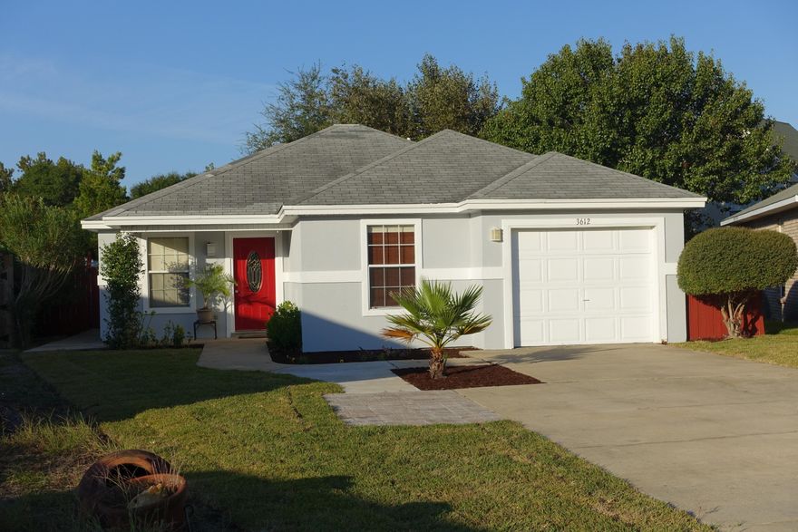 Centrally located in the middle of Destin & convenient to the Harbor. This nice 3 bedroom/ 3 bath home is on a quiet street among other comparable homes. The property is very deep with a long driveway allowing multiple vehicles to park. This uniquely positioned property has an easement through the back of the property to Mountain Drive in addition to the front driveway access. The main home consists of a large living area open to the kitchen and dining areas. The master suite has a full bathroom, walk-in closet, & sliding glass door for access to the outdoor deck & multiple living areas. The 2nd Bedroom has a separate bathroom with granite top vanity. Garage has been converted into another room and can be easily changed to accommodate a vehicle. 3rd Bedroom is in Mother-in-law suite.