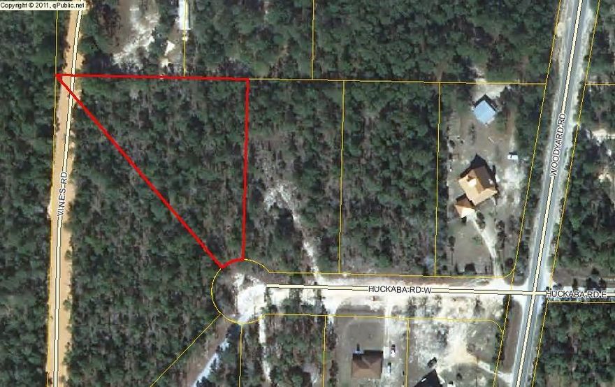 OVERSIZE LOT CONVENIENT TO EVERYTHING! Bring us an offer for this large 1.3 acre lot located in a very convenient area just off paved Woodyard Road in an area of nice single family homes. Located just minutes away from Walmart, Winn Dixie, and other shopping, Woodyard Road connects to Bob Sykes Road, making this a 30 minute commute to Niceville and Eglin AFB. This wooded lot has public water available (tap fee due). Electric is nearby. Lot would require a septic tank. All measurements and suitability for intended use needs to be verified by Buyer at Buyer expense. No survey.