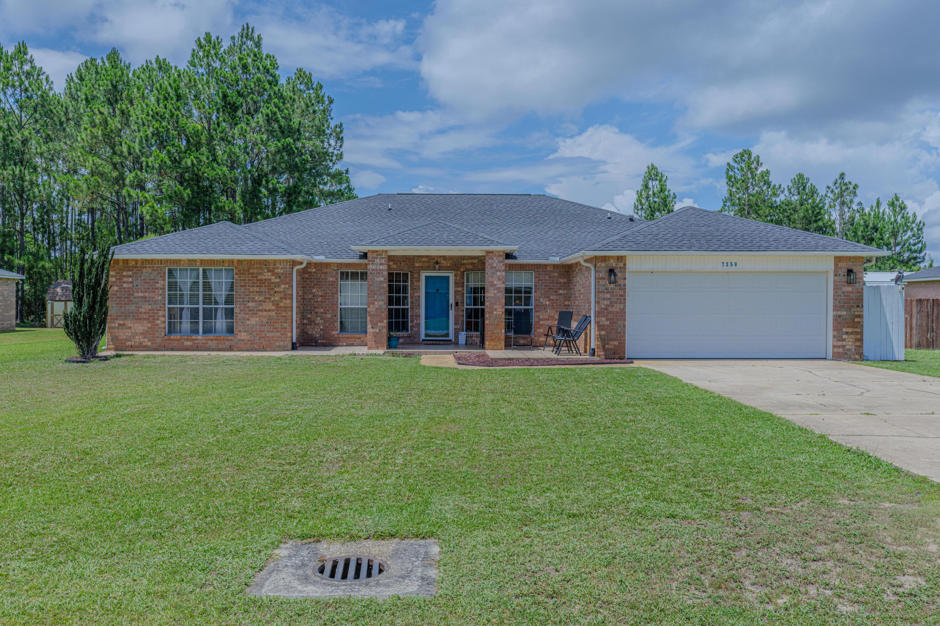 Kick your feet up and watch the family play in your private, screened-in, in-ground pool in this move-in ready home! Located in the sought-after Holleyby the Sea community of Navarre, this 4-bedroom, 3-bath beauty is situated on a generous half-acre fenced lot, which offers privacy but quick accessto the military bases, top-rated schools, and sandy white beaches of the Gulf of Mexico. This home boasts charming features, such as luxury vinyl plank, a foodie's dream kitchen with beautiful white quartz countertops, and a beautiful primary suite with his and her vanities, dual walk-in closets, and a separate soaking tub! This home offers a nearly new roof (2022), hot water heater (2022), new pool pump and filter, new recess lighting in the living room, new pool cage, smart home upgrades.