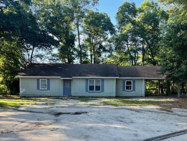Waterfront property in the heart of fast-growing Freeport with incredible potential for homeowners or commercial investors. This nearly 3/4 acre lot with approx. 75' on LaGrange Bayou offers future land use as General Commercial. The 3 bed, 1 bath home (built in 1999) sits toward the rear and includes a carport, back porch, and a detached 2-car garage with power. Direct bay access via pontoon or small boat makes it ideal for a primary residence, vacation getaway, or business venture. Renovate and enjoy or redevelop for commercial use--endless possibilities in a high-visibility location with water frontage and growth all around.