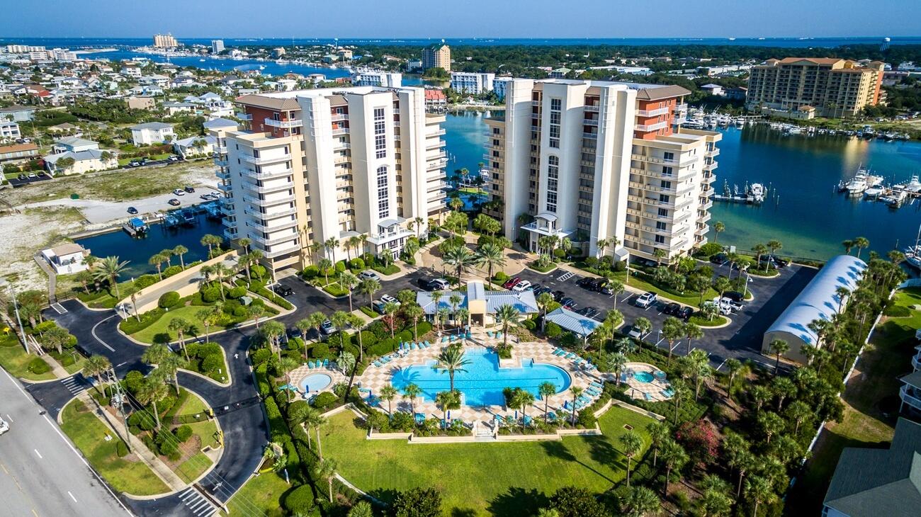 Harbor Landing is on the south shore of Destin Harbor at the east end of the harbor, across the street from the beach with dedicated beachwalk access. Envision to create your Destin lifestyle from this luxury 3Br/3Ba condominium that gives you a fabulous 11th-floor westward view, enjoying walks along the water on the beach (and moonlit strolls on those nights), with harborfront dock access for the water taxi to take you to your whim of daily and nightly choices of Destin Harbor attractions. 10-ft ceilings. Granite countertops. Tile floors. A proper laundry room. Large balcony suitable for al fresco dining. Large walk-in storage room. 2 covered parking spaces directly below. Two pools, hot tubs. Well-funded and well-managed condominium association. Full-time on-site maintenance.