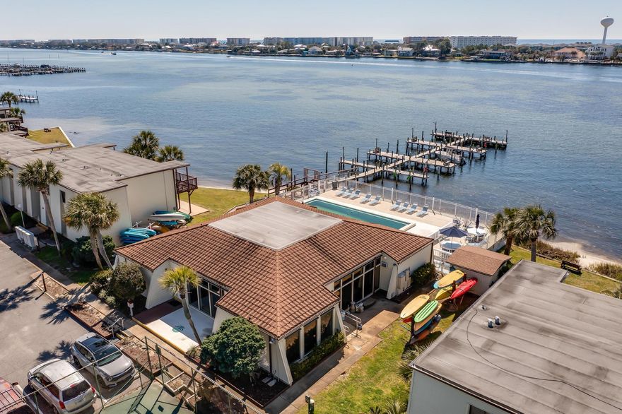 This beautiful 2-bedroom, 1-bathroom condo is just steps away from the waterfront community pool and the scenic Intracoastal Waterway. Inside, you'll find spacious bedrooms, with the master suite offering direct access to the bathroom, which features both a shower and a large soaking tub for ultimate relaxation. The spare bedroom includes a convenient Murphy bed, perfect for guests or extra space when needed. The unit also comes with a washer and dryer for added convenience. Plus, homeowners have the opportunity to rent a boat slip when available. With an appropriate offer, the condo can also be sold fully furnished, making it a perfect turnkey home. Don't miss this chance to live in a peaceful waterfront community!