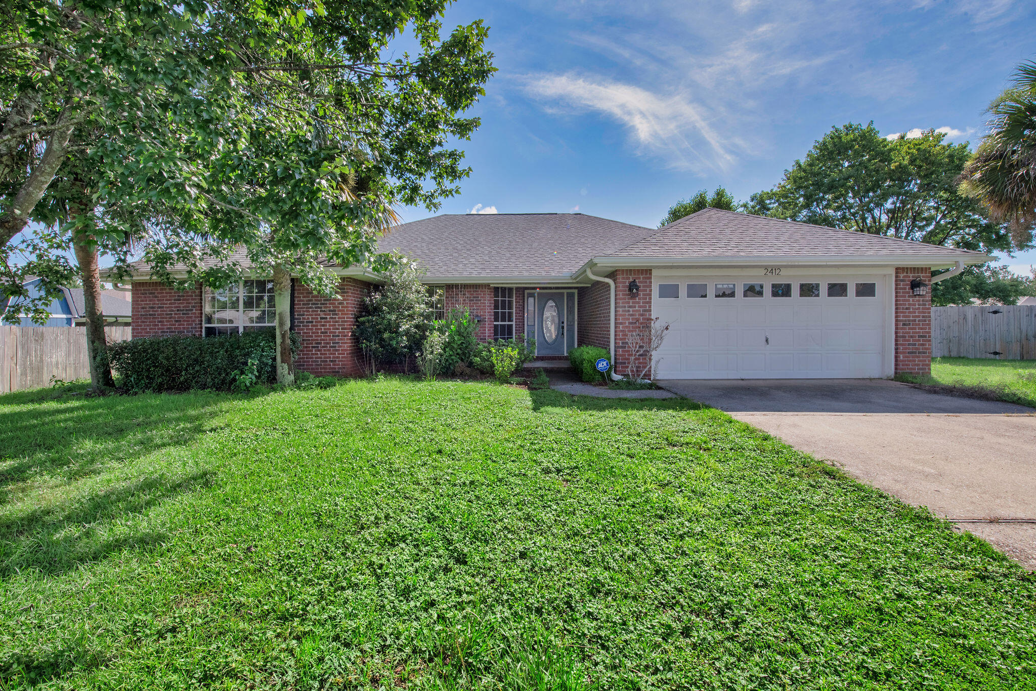 Tucked away on a quiet cul-de-sac in East Navarre, this charming 3-bedroom, 2-bath home is ready to welcome you. Step inside to a spacious living area with beautiful wood floors as well as tile through home--no carpet to worry about! The kitchen is light and bright with plenty of cabinets and stainless steel appliances, making it easy to gather for meals and entertaining.The floor plan offers privacy for the primary suite, while two additional bedrooms provide space. Out back, enjoy a fully fenced yard--perfect for barbecues or simply relaxing on a quiet evening.Built with classic brick construction, this home is as solid as it is inviting. Conveniently located near schools, shopping, and just minutes from Navarre's beautiful beaches, you'll have everything you need close by!
