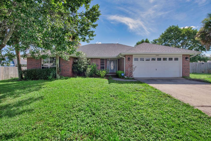 Tucked away on a quiet cul-de-sac in East Navarre, this charming 3-bedroom, 2-bath home is ready to welcome you. Step inside to a spacious living area with beautiful wood floors as well as tile through home--no carpet to worry about! The kitchen is light and bright with plenty of cabinets and stainless steel appliances, making it easy to gather for meals and entertaining.The floor plan offers privacy for the primary suite, while two additional bedrooms provide space. Out back, enjoy a fully fenced yard--perfect for barbecues or simply relaxing on a quiet evening.Built with classic brick construction, this home is as solid as it is inviting. Conveniently located near schools, shopping, and just minutes from Navarre's beautiful beaches, you'll have everything you need close by!