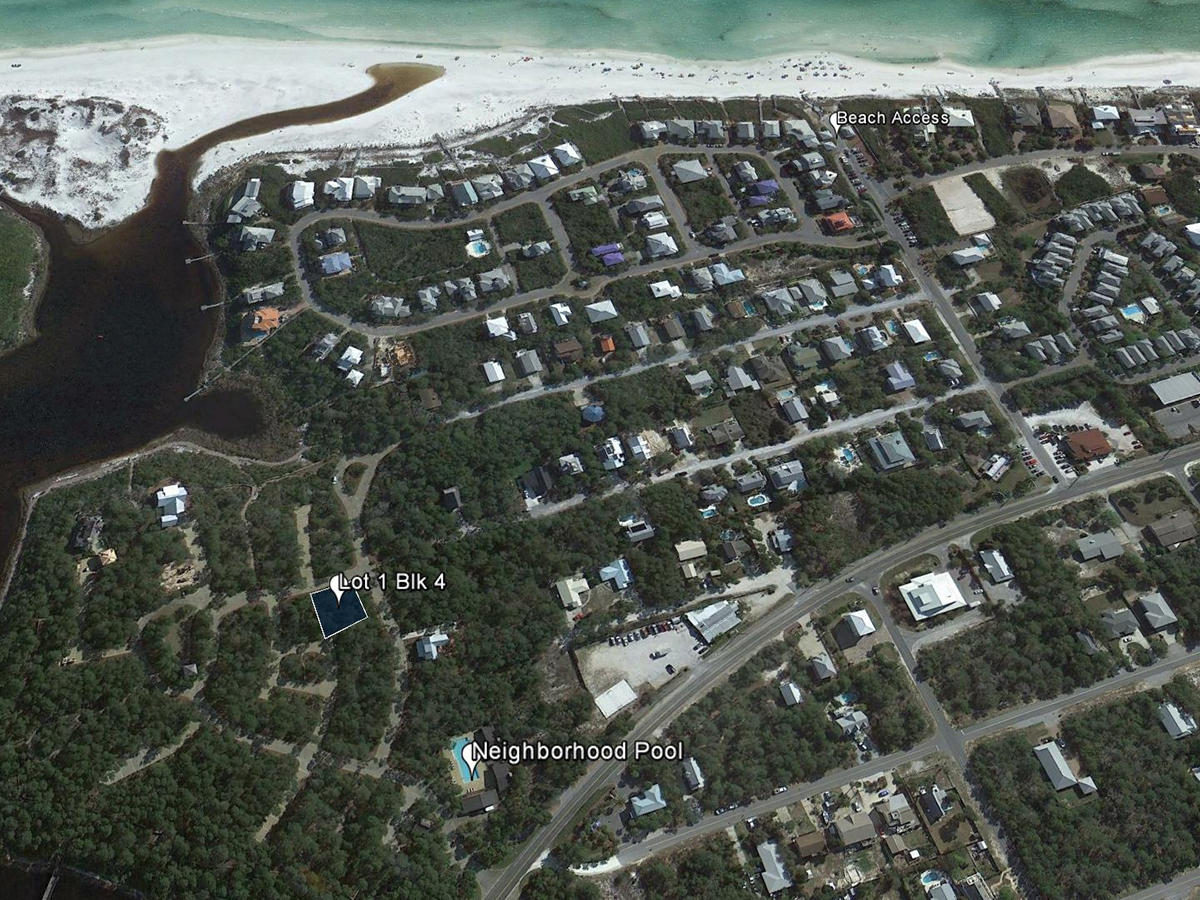 This corner lot is located only a short walk from the pool in the unique community of Draper Lake, which was designed to protect wild life and marine life surrounding this rare, coastal dune lake. Owners have easy access to two swimming pools, two boat houses, a 45-foot observation tower, parks, and bridges which connect the peninsulas. This 28-acres development offers residents walking paths and nature trails throughout with the added benefit of being close to dining and shopping along 30A.