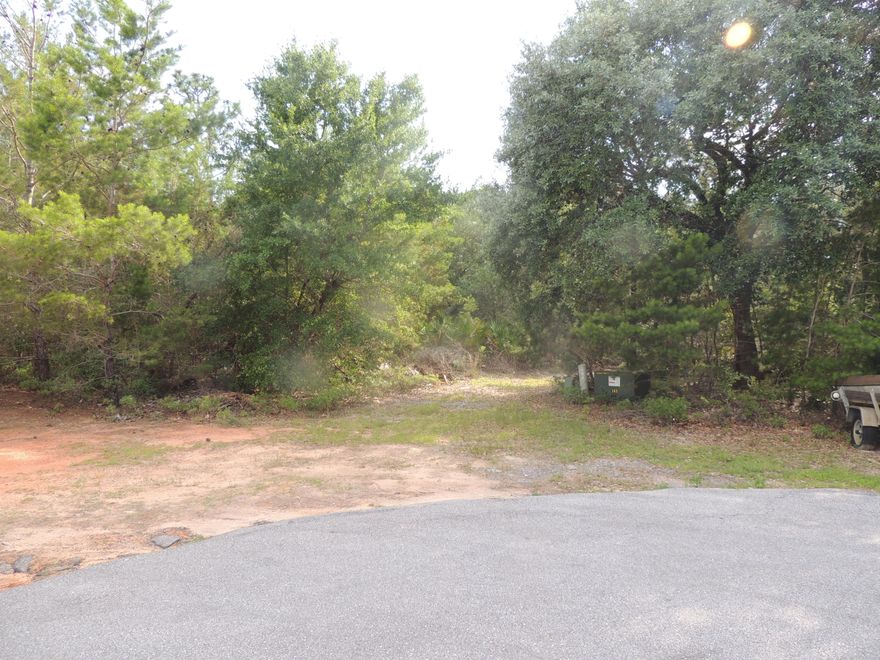 This one of a kind lot is nestled at the end of Apples Way. It features commanding views of the fifth fairway of Hidden Creek golf course. With both the location and the size of this lot, you have numerous possibilities to locate your dream home with numerous views of the course. Take a look today, bring your architect and builder. This is the perfect location, close in to all the amenities of Holley By the Sea, yet off of the main streets.