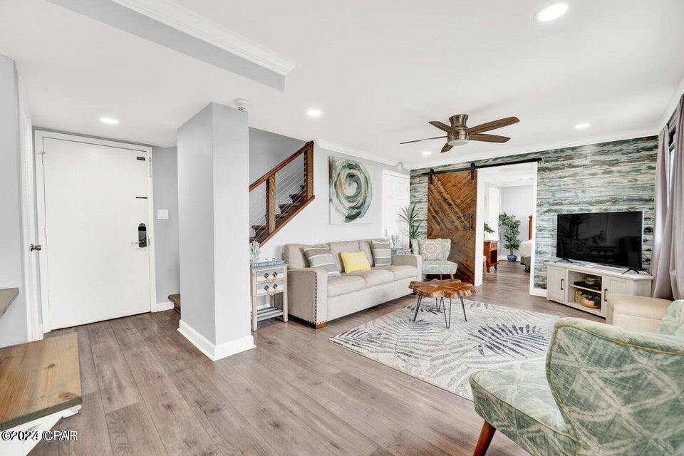 UNBELIEVABLE PRICING!!! SELLER SAYS BRING ME AN OFFER!Stunning views of the Gulf from the master bedroom with balcony and the unique coastal dune lake, Lake Powel from the living room. WOW! 2 balconies with two different water views only in Pinnacle Port. This 3\3 has been FULLY RENOVATED and furnished with all your needs for family entertainment or turn-key investment. Beautiful Beachy decor throughout this condo. NEW HVAC, New Electrical. No expense spared. Fresh paint throughout. Fully remodeled kitchen includes new cabinets, countertops, backsplash, fixtures, and redesigned layout. New floors through-out the entire unit. The staircase has been opened up to provide a more open feel to the unit. Scraped ceilings and crown molding added through the unit. The downstairs bedroom has an ensuite bathroom. The upstairs bedrooms have been redesigned to maximize usable space. Both bathrooms upstairs have been remodeled. This complex has so many amenities to offer. Gated with security, lighted Tennis courts, 2 pools, with one of them an indoor/outdoor heated pool, covered BBQ area, basketball, Shuffleboard, bocce ball, game room, fitness center with sauna and steam room, and docks with boat slips on Lake Powell. Why decide between a lake house and a beach house when you can have both. This 3/3 has stunning views of the gulf and great views of lake Powell. (the largest coastal dune lake in the country) One of the best kept secrets in Panama City Beach. Minutes from Scenic 30A with all the special Restaurants, shopping and fun!