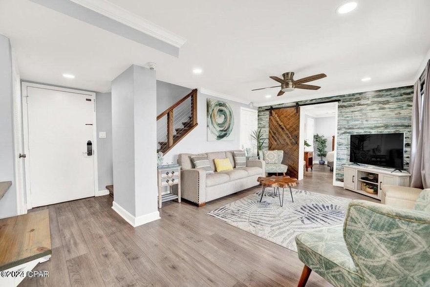 UNBELIEVABLE PRICING!!!  SELLER SAYS BRING ME AN OFFER!Stunning views of the Gulf from the master bedroom with balcony and the unique coastal dune lake, Lake Powel from the living room.  WOW!  2 balconies with two different water views only in Pinnacle Port. This 3\3 has been FULLY RENOVATED and furnished with all your needs for family entertainment or turn-key investment. Beautiful Beachy decor throughout this condo. NEW HVAC, New Electrical. No expense spared. Fresh paint throughout. Fully remodeled kitchen includes new cabinets, countertops, backsplash, fixtures, and redesigned layout. New floors through-out the entire unit. The staircase has been opened up to provide a more open feel to the unit. Scraped ceilings and crown molding added through the unit. The downstairs bedroom has an ensuite bathroom. The upstairs bedrooms have been redesigned to maximize usable space. Both bathrooms upstairs have been remodeled. This complex has so many amenities to offer. Gated with security, lighted Tennis courts, 2 pools, with one of them an indoor/outdoor heated pool, covered BBQ area, basketball, Shuffleboard, bocce ball, game room, fitness center with sauna and steam room, and docks with boat slips on Lake Powell. Why decide between a lake house and a beach house when you can have both. This 3/3 has stunning views of the gulf and great views of lake Powell. (the largest coastal dune lake in the country) One of the best kept secrets in Panama City Beach. Minutes from Scenic 30A with all the special Restaurants, shopping and fun!