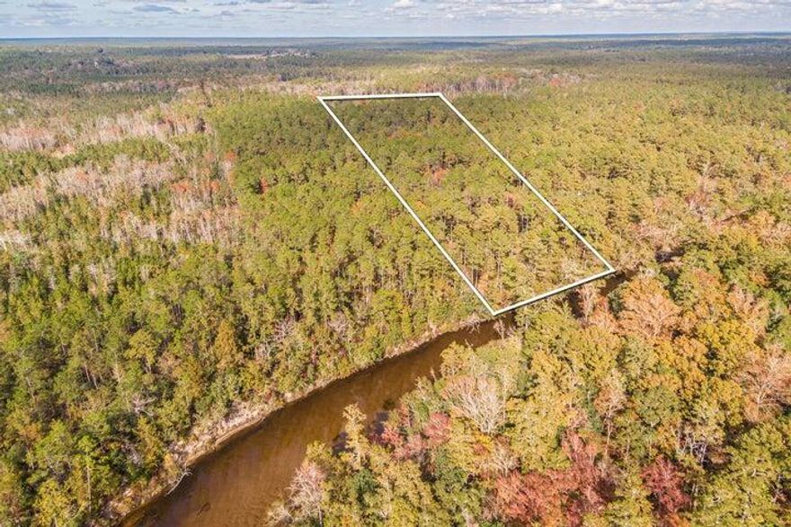 Beauitfull  4.4 acres on the Shoal River, which has a clear sandy bottom. Deep in the woods, this is ideal for camping and hunting. Seclueded yet close to town this property would make a great weekend getaway.  The owners stated that there are many deer and wild hogs in the area for the hunters! Call today to schedule an appointment to view this unique waterfront acreage.