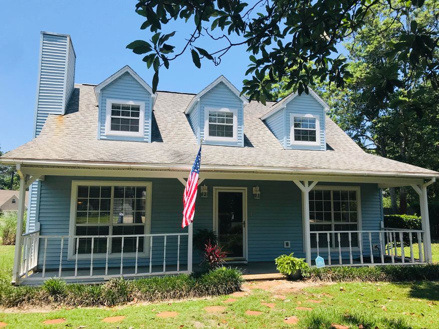 Character and charm abound in this renovated, move-in ready home in Bluewater Bay with no HOA! The wow-factor begins with the beautiful exterior that has tons of curb appeal and continues to the tasteful updates inside! New flooring, granite countertops, updated bathrooms and light fixtures, just to name a few! Downstairs you'll find a living/family room with an office on one end and a large, family dining room that is open to the kitchen area. Off of the kitchen, there is a heated and cooled sunroom that you can enjoy all year and when the weather is nice, a deck area for entertaining in your spacious fenced-in backyard. Upstairs, each of the 3 bedrooms is bathed in natural light. The master bedroom feels like a retreat with a spa-like en suite bathroom!