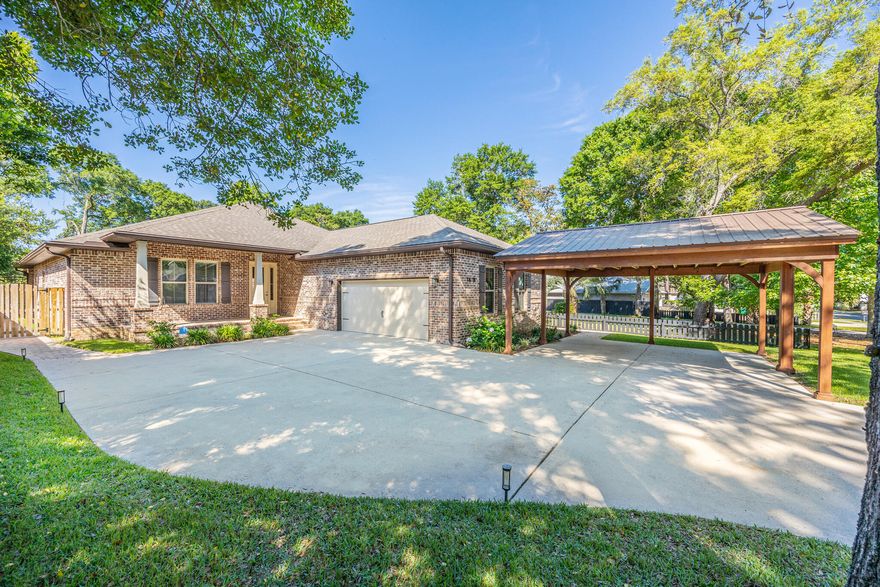 Open House this Saturday, 5/17/25 from 1pm - 3pm.  Multiple offers have been received, please submit your highest and best offer.  Sellers are offering a VA Assumption for roughly 70% of the asking price at a 2.25% Interest Rate.  Open Concept, 4 bed/3.5 bath, all brick, custom built home in a great location.  Gourmet kitchen with beautiful, shaker-style wood cabinets, quartz counter-tops and a large pantry.  The spacious Master Bedroom has his & her walk-in closets with built-in shelving and walks out to the backyard; the Master Bath has his & her vanities, a corner whirlpool tub and a large, tile shower with glass doors.  One of the additional bedrooms also has its own attached full bath and walk-in closet.  There is also an office with custom barn doors, that could easily be used as another bedroom. Tile plank flooring throughout the home with crown molding, 9'-10' ceilings and tray ceilings in the Master & living area. A large backyard with covered patio and pergola, a great space for entertaining. There is a 2-car covered carport in addition to the attached garage.  Just minutes away from Military bases, beaches, shopping and the Fort Walton Beach Golf Course.