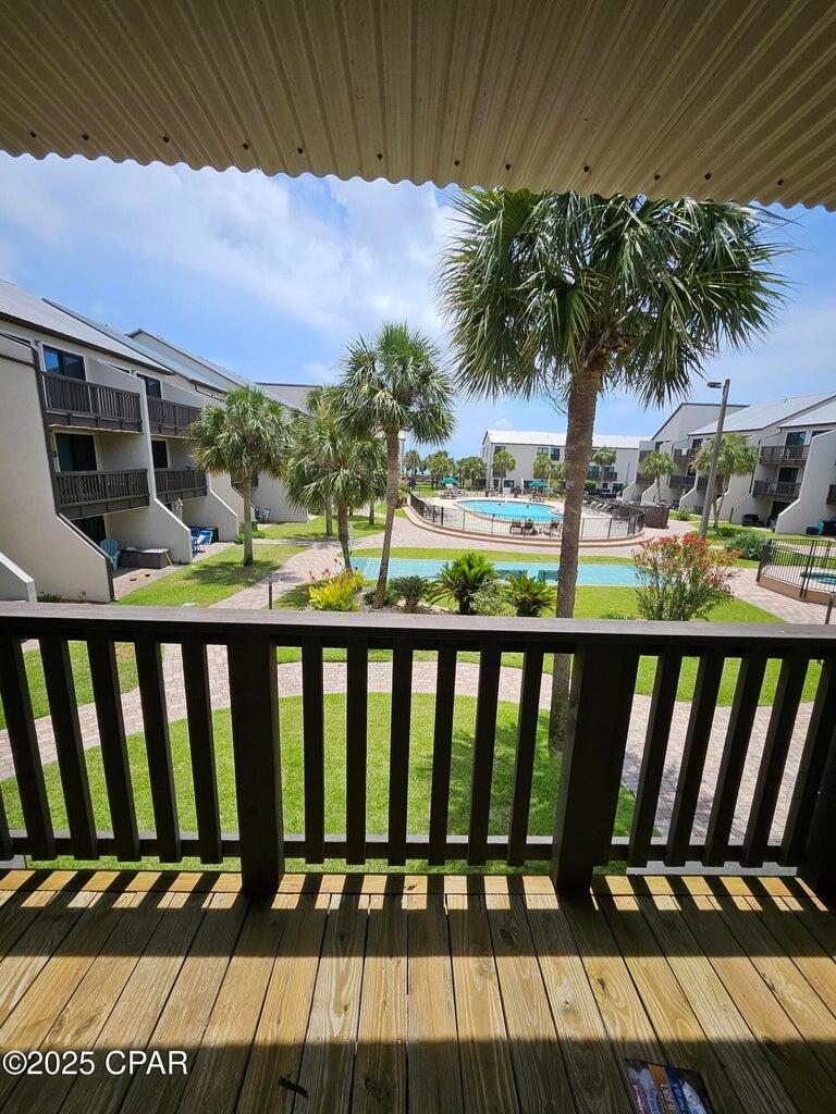 UNDER CONTRACT WITH CONTINGENCIES; SELLER ACCEPTING BACKUP OFFERS.PERFECT FLIP SCENARIO: 1.) Assume loan or $159,000 (may be lower by closing date). 2.) Cash or financing for difference between loan amount and purchase price. 3.) Remodel the condo (materials already purchased, listed below). 4.) Put the property back on the market at today's remodeled market price of $340,000 - $350,000 5.) PROFIT, PROFIT, PROFIT Gulf view from balcony. Here are the materials that have already been purchased and paid for by the seller: - Cabinets and appliances and custom plantation shutters -Sheetrock and sheetrock mud to complete covering of open areas in the ceiling bedroom and full bathroom on main entrance level. -42 inch complete fiberglass shower unit (pan was with rest of unit outside of box). -toilet for full bathroom lower level (not damaged). -mirrored door to be reattached to maintenance closet bedroom. -ring box for doorbell under sink in bathroom adjacent to bedroom. Not activated at this time but ring doorbell has been mounted on entrance door. -plywood to cover the main level bathroom floor only. -gray paint in 2 - 5-gallon buckets (Sherman Williams - big chill is color gray paint). Enough to paint entire unit. -new pocket door for new bathroom on main level is on top floor out of way for structure repair. louvered door for laundry is in storage unit.** **A louvered door that goes on the washer/dryer closet in bedroom is located inside unit 142 storage unit outside bedroom entrance. The door will require a new door frame; the actual door should be fine as stored in dry space. Teak high bar seat (goes outside 3rd floor bedroom door. Gray wicker chair with side table goes on top floor balcony. There is furniture in a storage unit that can be purchased separately via cashier's check to seller at closing. *Furniture inventory can be confirmed once under contract. Storage unit on 3rd flood is deeded to C142.