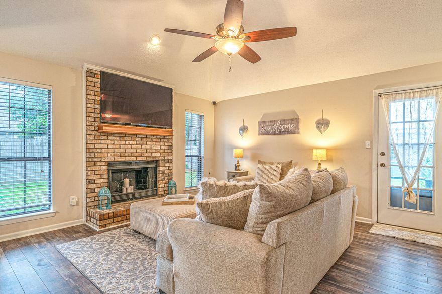 Cozy and well cared for four bedroom home conveniently located in East Navarre, just minutes away from beaches, dining, and shopping! The open living space welcomes you to come in and enjoy the central fireplace with plenty of natural light.