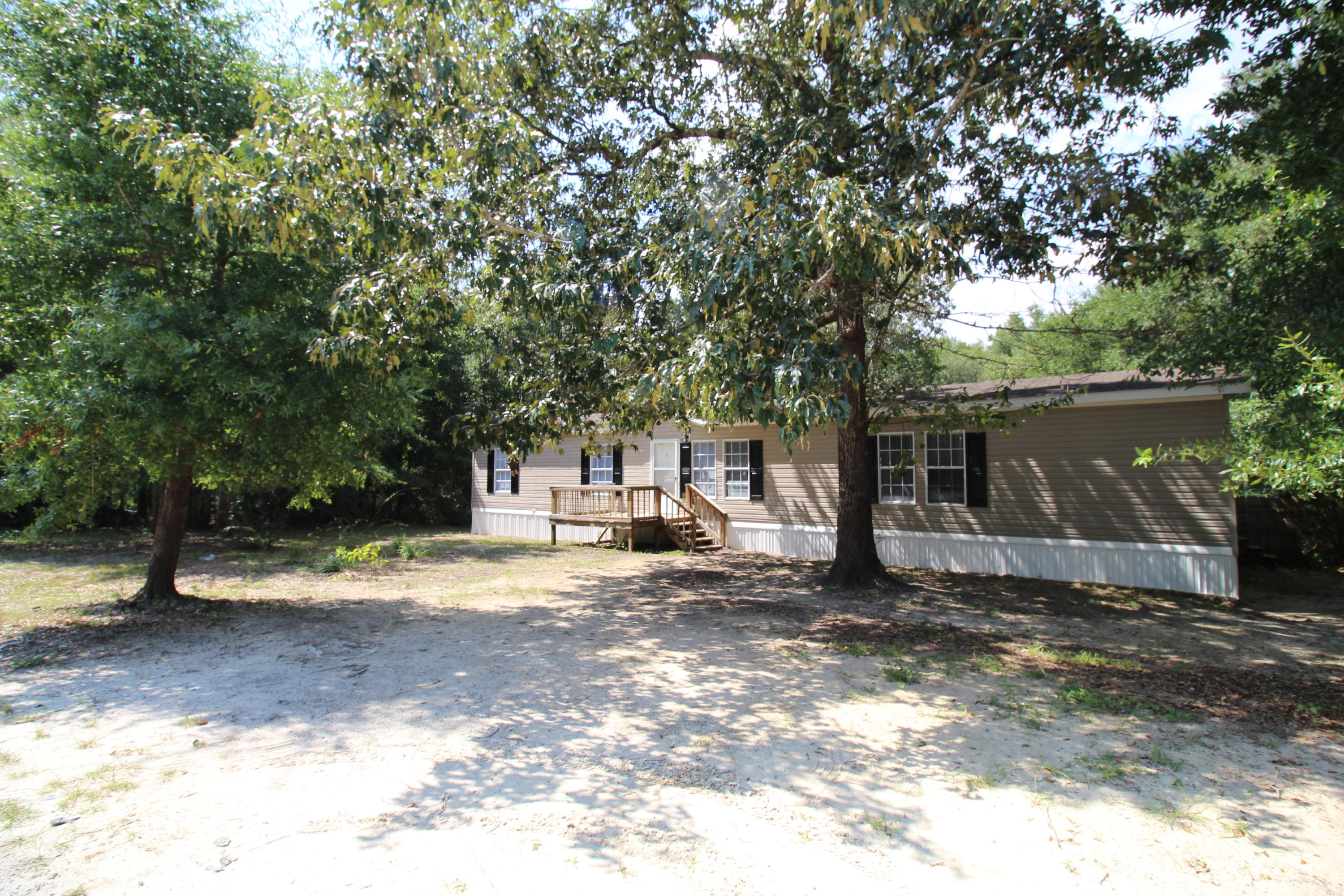 REO - 5 BEDROOMS, 3 FULL BATHS! Spacious and updated. Set on almost an acre, this home has everything! Split floor plan, fireplace, and a large open kitchen with center island. The master bedroom is complete with walk in closet and en suite with garden tub, and separate shower. A 2nd full bath in the hall and a 3rd full jack-n-jill bathroom shared by the back two bedrooms. AND a deck off the back overlooking the private country setting...SELLER FINANCING OPTION..all measurements are approximate and should be verified