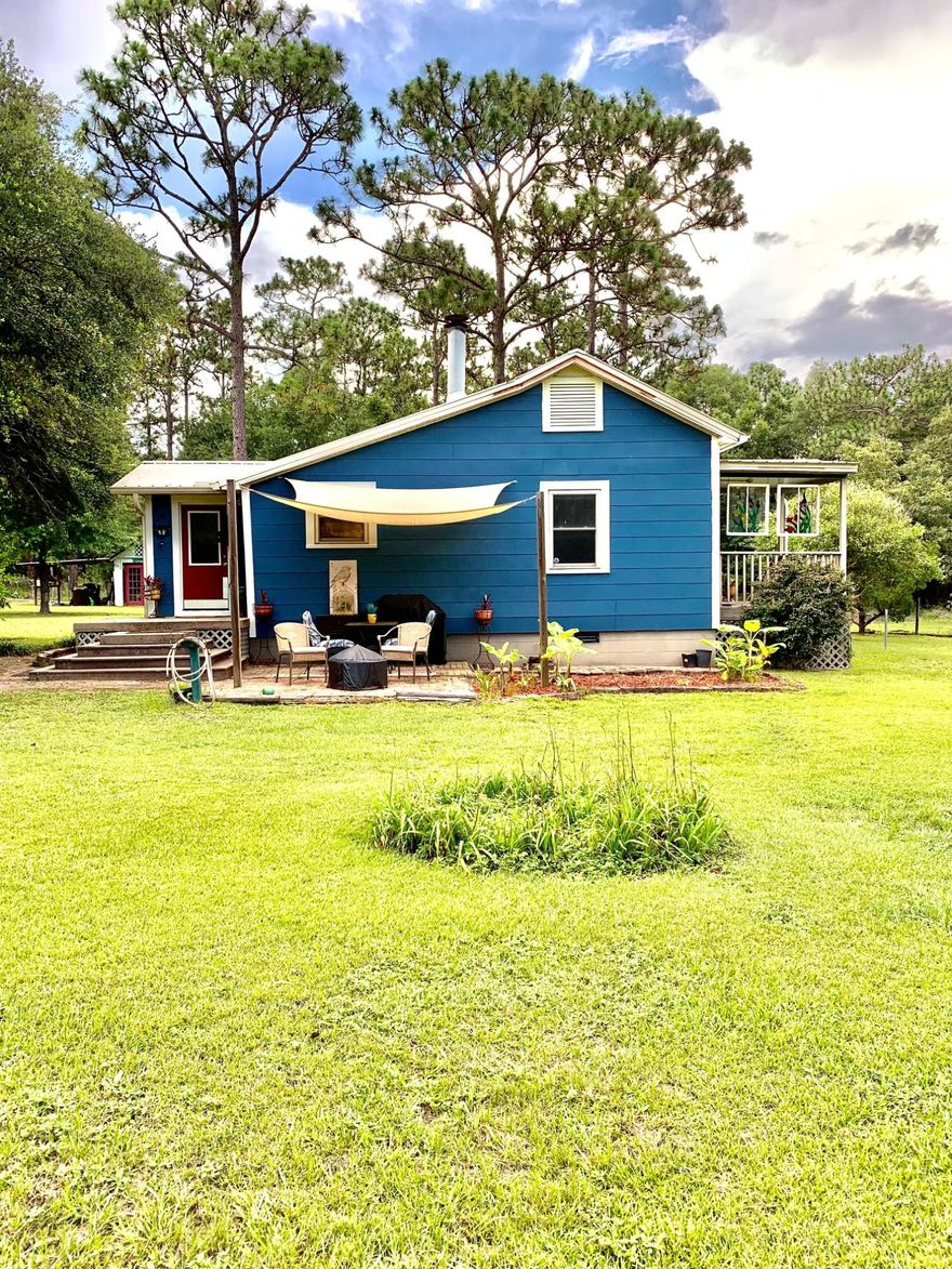 This quaint little cottage with matching Guest House is everything you have been waiting for! This property is 4 acres, south of Interstate 10 just under 30 minutes to the Beaches of South Walton. Approximately 2 acres of the property is fenced. Large pole barn built in 2015. The main house is 2 bedroom, 1 full bath.  The guest house has an open living/kitchen space with a full bath and area that would be perfect for bunk beds to add additional sleeping. Buyer must verify all measurements to own satisfaction.