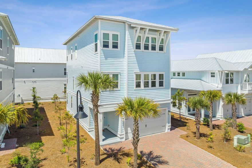 This coastal retreat is a beautifully decorated and well-crafted home, perfect for those who appreciate Southern living and beachside relaxation. The home's features, including shiplap and crown molding, 8ft doors, and 10ft ceilings, suggest attention to detail and high-quality craftsmanship. The large windows and porches on all three levels offer plenty of natural light and opportunities to enjoy the beautiful views. Additionally, the elevator provides easy accessibility to all three floors, making it an ideal home for those who require or prefer mobility assistance.This 4-bedroom beach house has two master suites, one on the first floor and one on the third floor, offering flexibility and privacy for residents or guests. The Chef Inspired kitchen and expansive Great Room are perfect