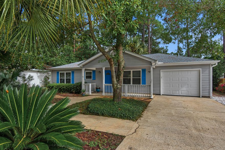 Sleek, modern home cradled in lush landscaping, with many recent upgrades of about $32,000. New roof March 2022, new air conditioner August 2022, new hot water heater April 2022, newly painted walls August 2022! New flooring August 2022! Vinyl plank in subtle colors adds to spacious feeling of living room with cathedral ceiling open to the kitchen.  Granite counters and moveable granite center island for flexible arrangement. Master bedroom has large walk-in closet, and second bedroom has spacious closet, as well. Low maintenance yard with carefully selected plantings. Community pool. Set in a convivial neighborhood a couple of miles from the Gulf of Mexico beach on 30A and minutes to public boat ramp on Choctawhatchee Bay.