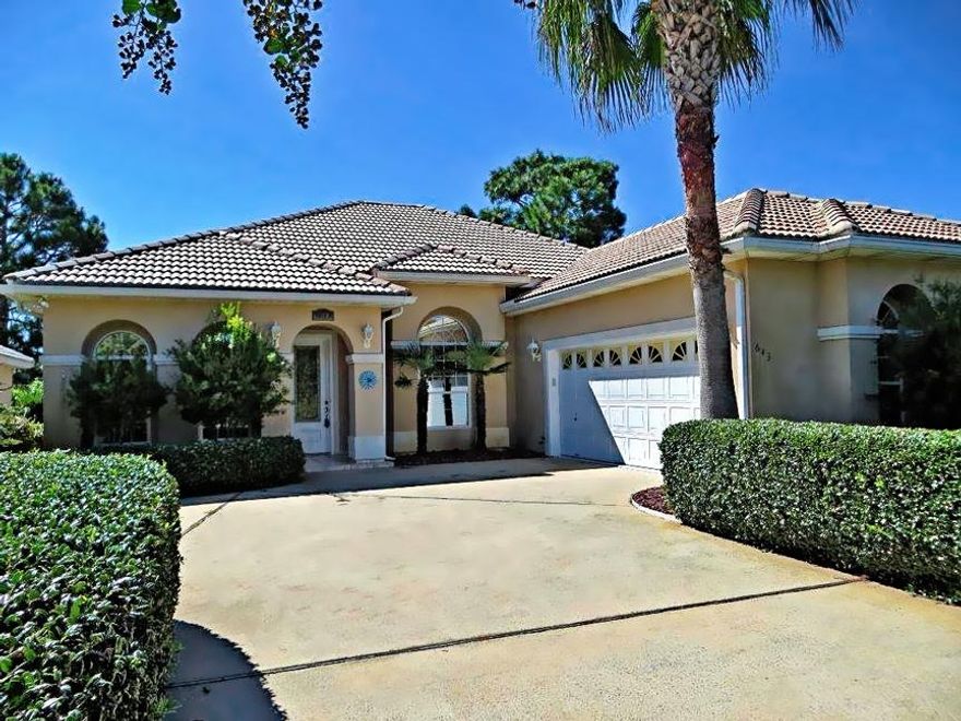 THIS VALUABLE PROPERTY:) Beautiful three bedroom, two bath custom home overlooking the 18th fairway in the desirable gated golf course community of Emerald Bay. Great floor plan thats perfect for entertaining, with 12 foot ceilings in the spacious living room, adjoining formal dining area, open kitchen and casual dining area. Enjoy your evenings on the large screened lanai with covered patio. Nicely appointed with raised ceilings, crown molding, recessed lighting, surround sound and granite counters. Spacious master suite has sitting area, direct access to the lanai and features a luxurious master bath with jetted tub, separate walk-in shower, private water closet, his and hers walk-in closets. Two additional bedrooms and a full bath are located on the opposite side of the home. A MUST SEE