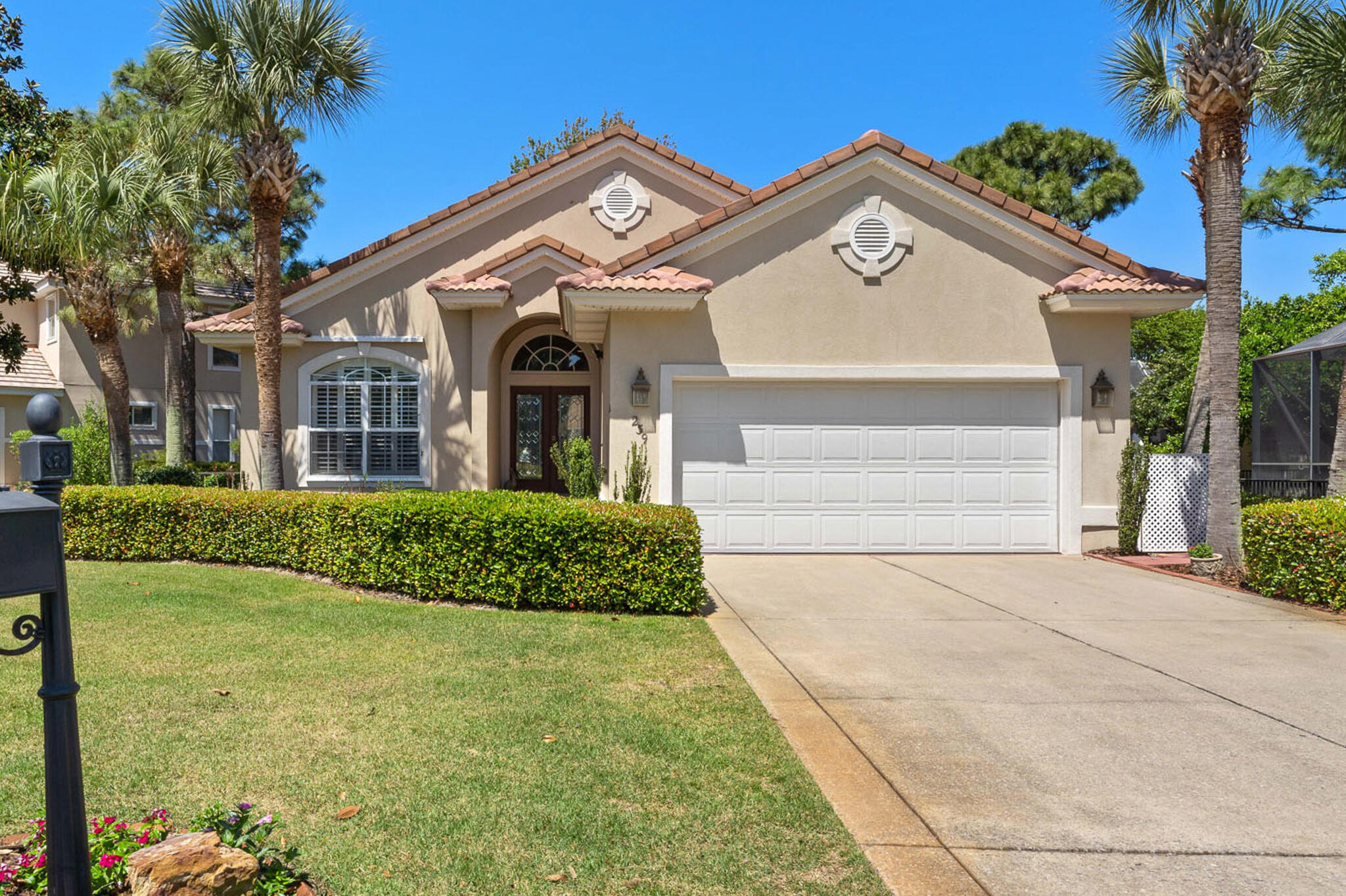 Beautiful lake-front contemporary home with 3 bedrooms and 2 bathrooms with gorgeous curb appeal. The private screened in back porch is accessible through large double sliding glass doors that are located directly off the dining room area. It is the perfect place to sit and relax after a day at the beach. You can see the lake straight from the kitchen all the way through to the water. This custom-built home is in a gated community and has been continuously updated since 2017 with heated flooring and a stand-alone shower with rain glass which brings a luxurious feel to the master ensuite. Soft-close cabinetry, quartz countertops, a gas stove, gas fireplace, ten-foot ceilings and canned lighting brings the elegance of this home to the next level. On the outside of the home, a tile roof,