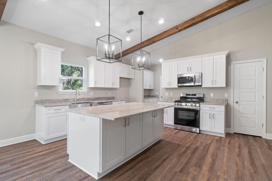 Welcome to this beautifully crafted, Craftsman-inspired single-family home that perfectly combines timeless style with today's modern conveniences. Offering 1,600 square feet of thoughtfully designed living space, this 3-bedroom, 2-bathroom gem is ideally located just minutes from the interstate, top-rated hospitals, shopping centers, and a wide variety of restaurants--offering unbeatable convenience in a sought-after area. Step inside to an inviting open-concept floor plan that seamlessly connects the living, dining, and kitchen areas--ideal for entertaining or everyday living. Soaring vaulted ceilings with custom cypress wood beams bring warmth and character to the spacious living room. The chef's kitchen is sure to impress, featuring stainless steel appliances, a gas range, quartz countertops, soft-close cabinetry, and a butler's pantry for added storage and prep space. Nine-foot ceilings throughout the home enhance the sense of openness and light. Retreat to the luxurious master suite, where the spa-like bathroom offers a freestanding soaking tub, a beautifully tiled walk-in shower, and elegant finishes that create a serene escape. A tankless water heater ensures you'll always have hot water when you need it. Outside, the generous fenced in backyard provides endless possibilitieswhether for outdoor entertaining, gardening, or simply enjoying your own private sanctuary. A two-car garage offers ample room for parking and storage.
