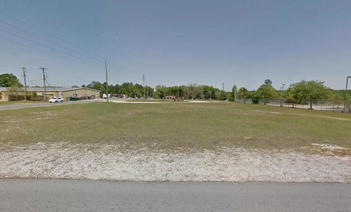 Cleared vacant corner lot next to the Post Office and located at the NEC of Baldwin Ave and 20th St. Zoned Light Industrial.The rear or southern 1.16 acres of Tax Id# 253N19190700018061